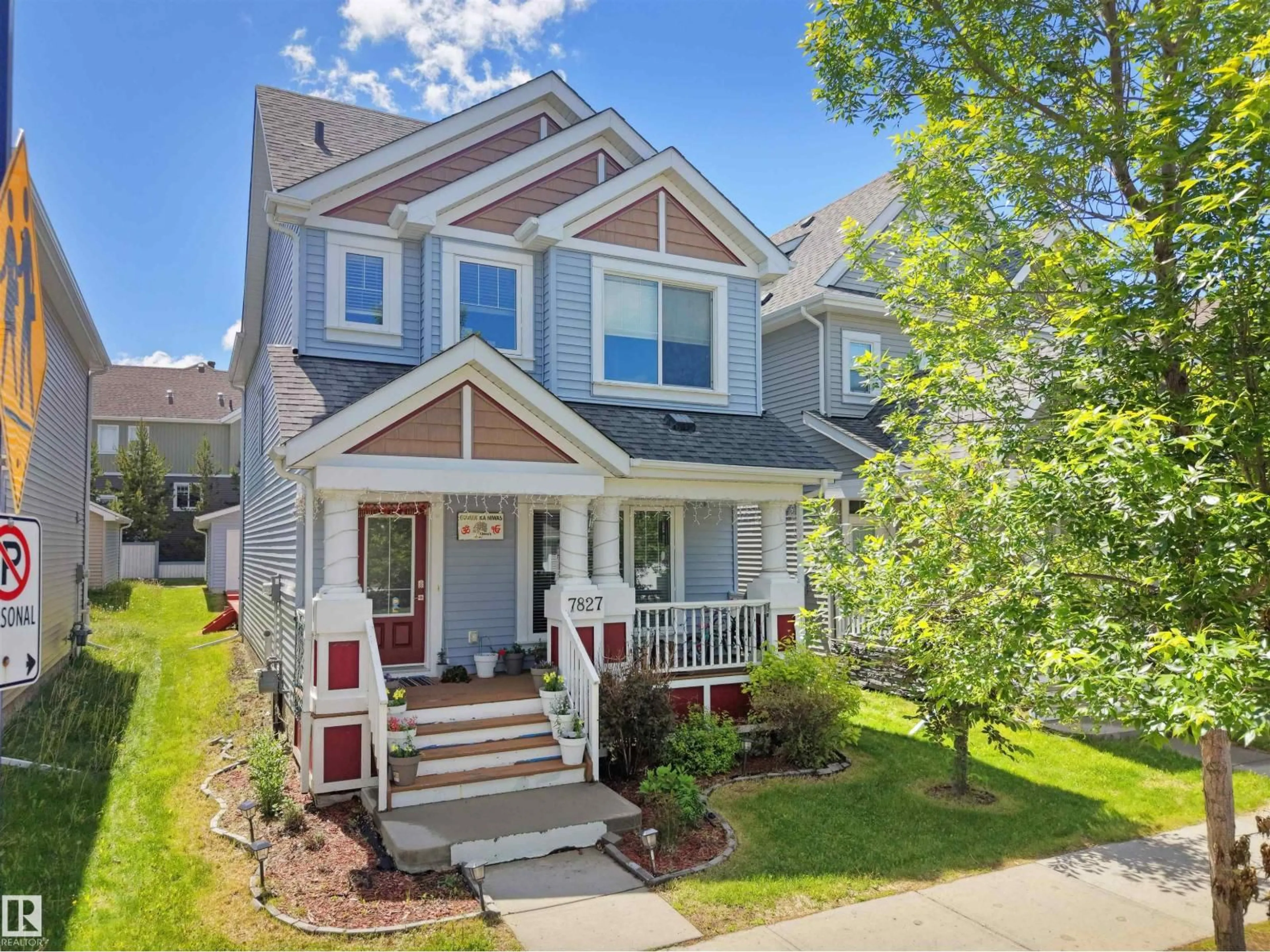 Home with vinyl exterior material, street for SW - 7827 22 AV, Edmonton Alberta T6X0Z2