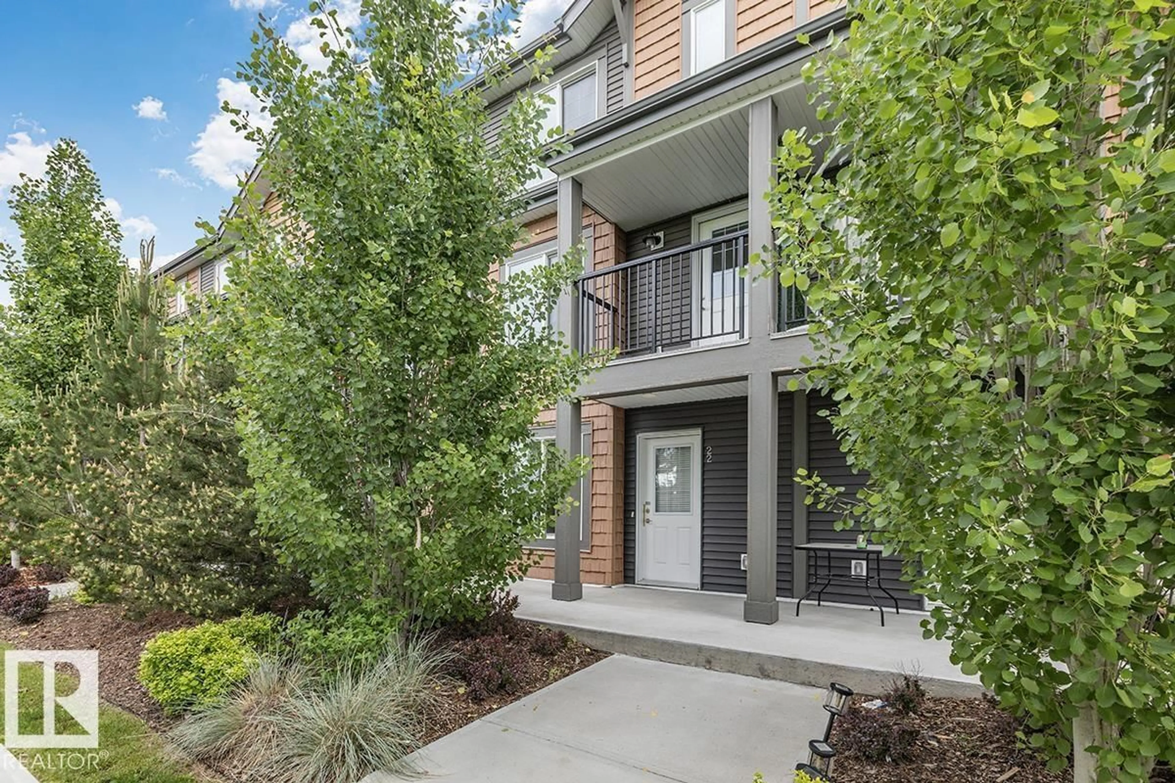 Patio, street for #22 - 3025 151 AV, Edmonton Alberta T5Y3W4