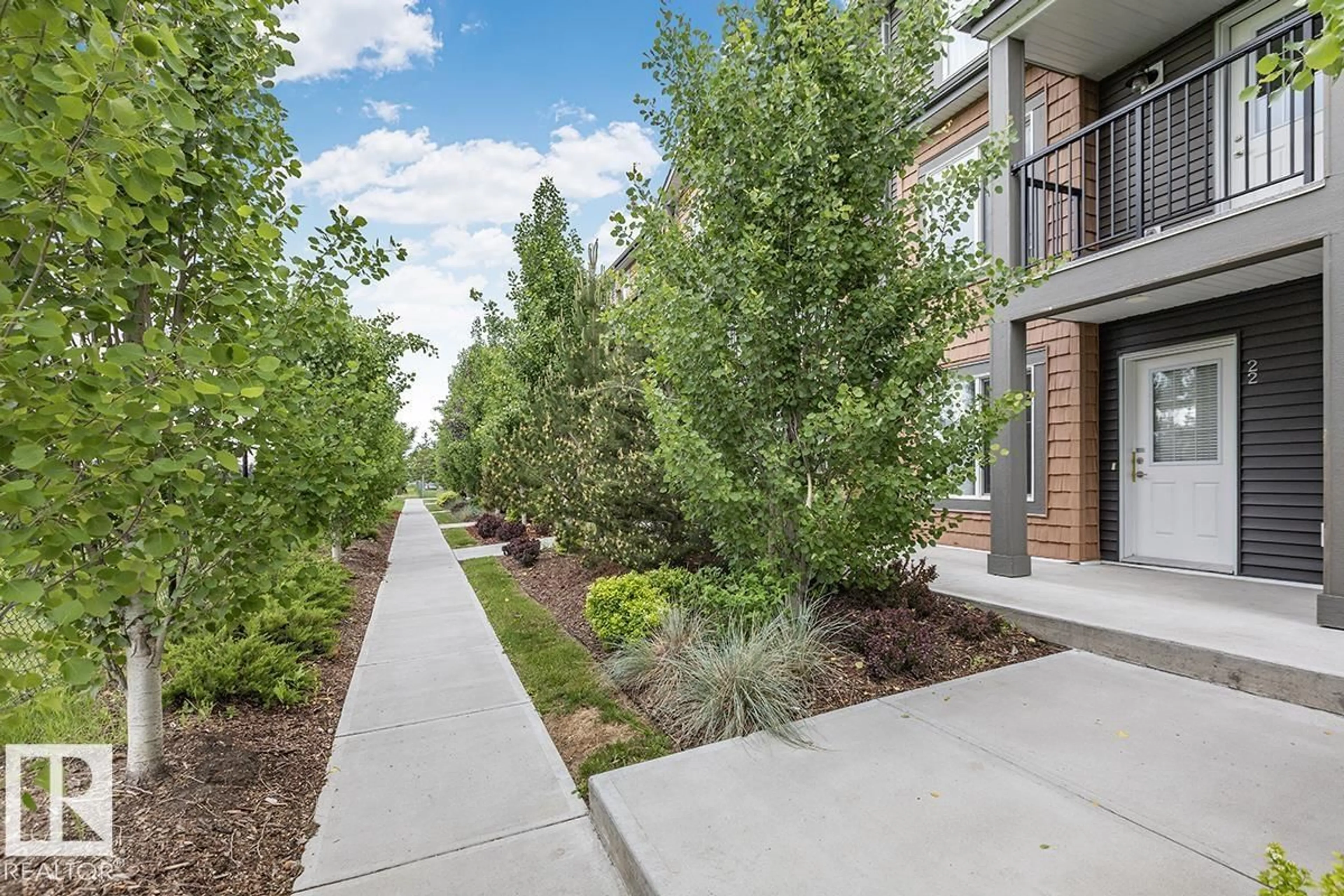 Patio, street for #22 - 3025 151 AV, Edmonton Alberta T5Y3W4