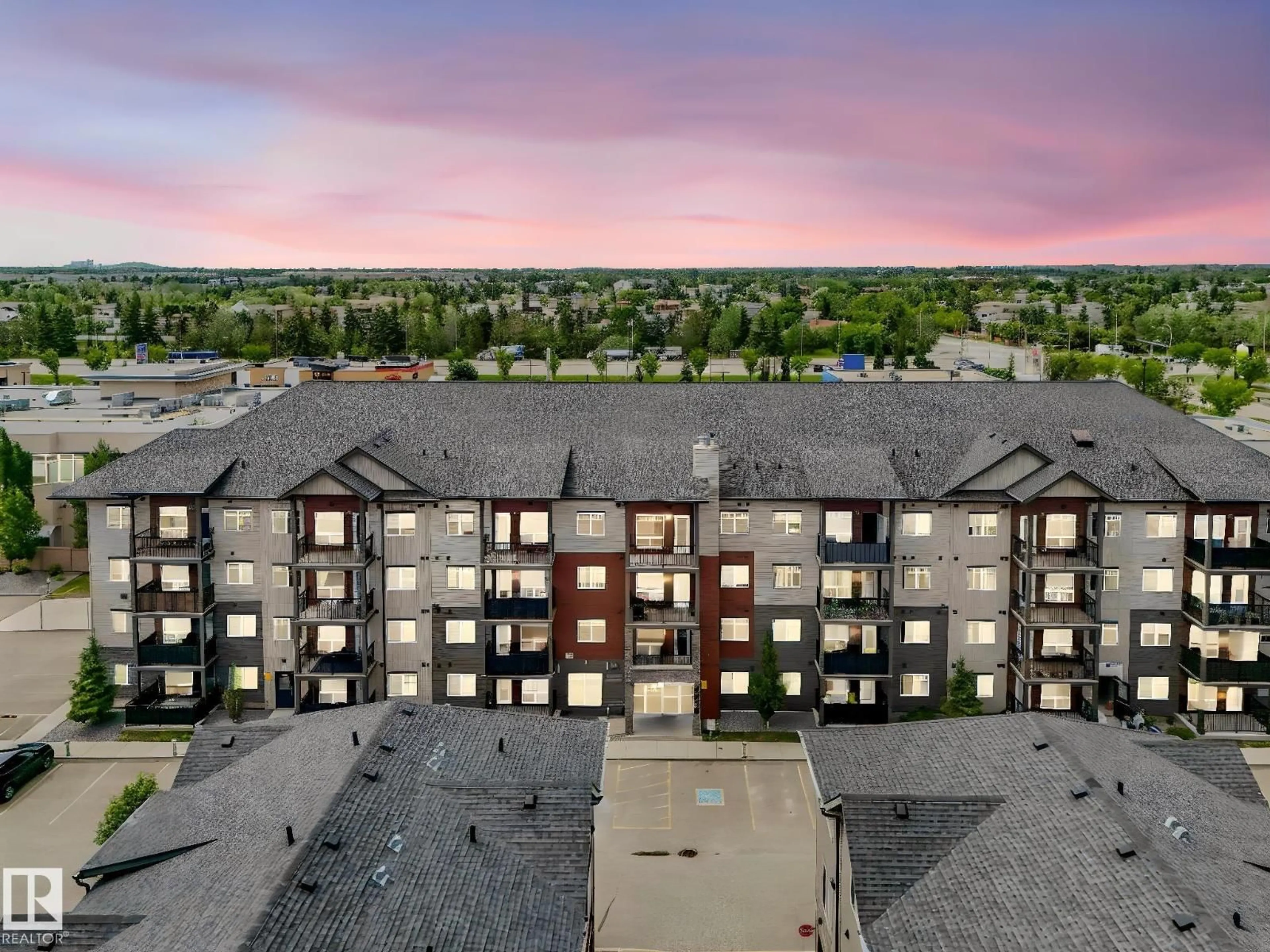 A pic from outside/outdoor area/front of a property/back of a property/a pic from drone, city buildings view from balcony for #406 - 9519 160 AV, Edmonton Alberta T5Z0N1