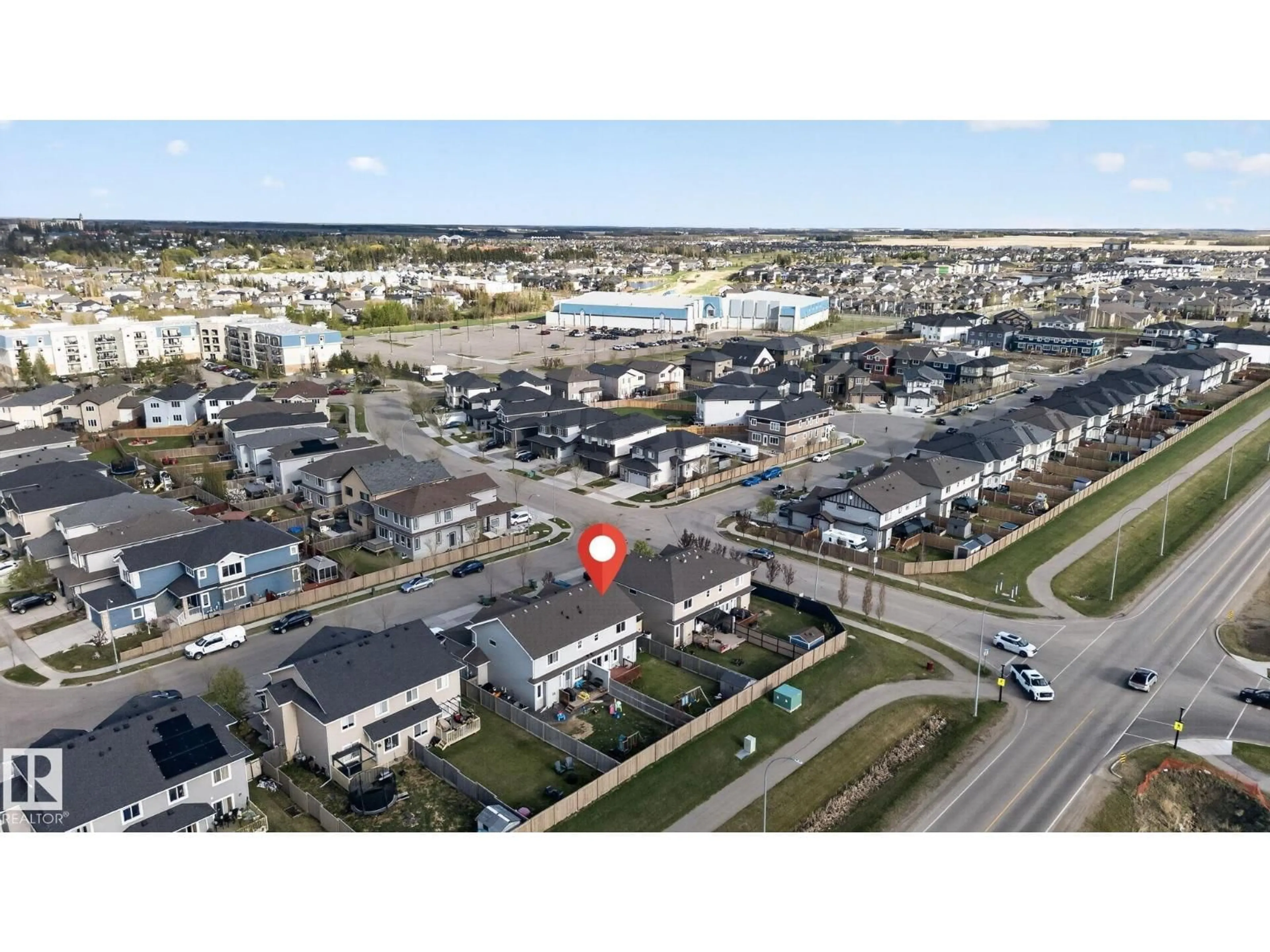 A pic from outside/outdoor area/front of a property/back of a property/a pic from drone, street for E - 5306 67 STREET, Beaumont Alberta T4X2A2