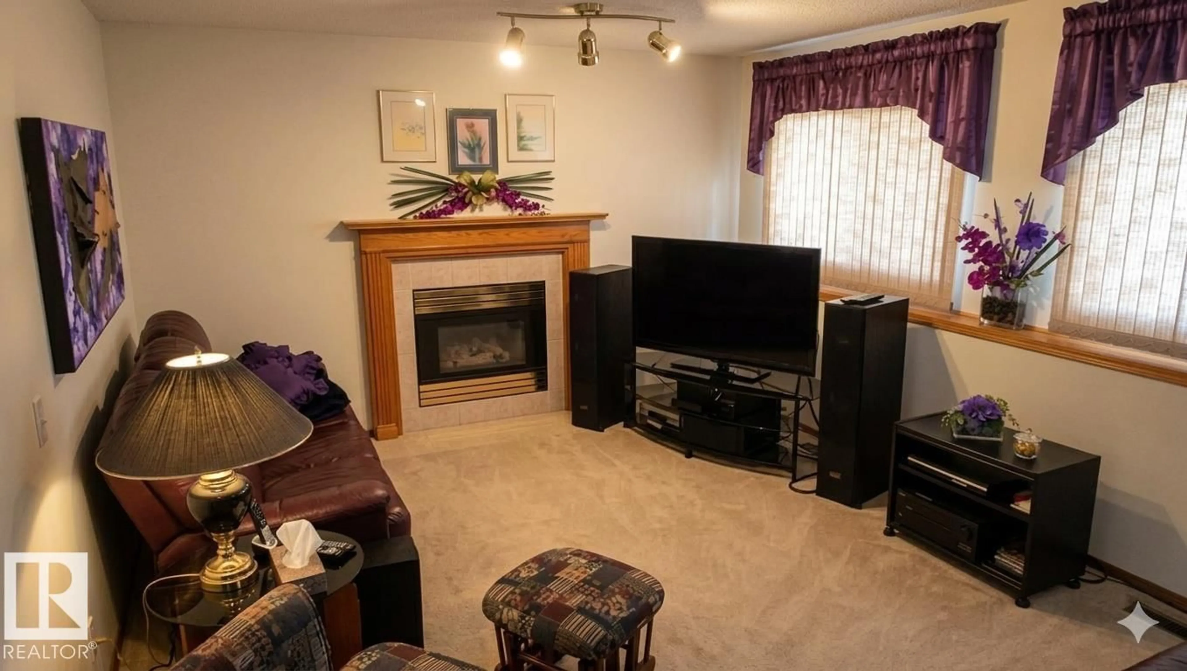Living room with furniture, wood/laminate floor for 1188 JOYCE RD, Edmonton Alberta T6L6V4