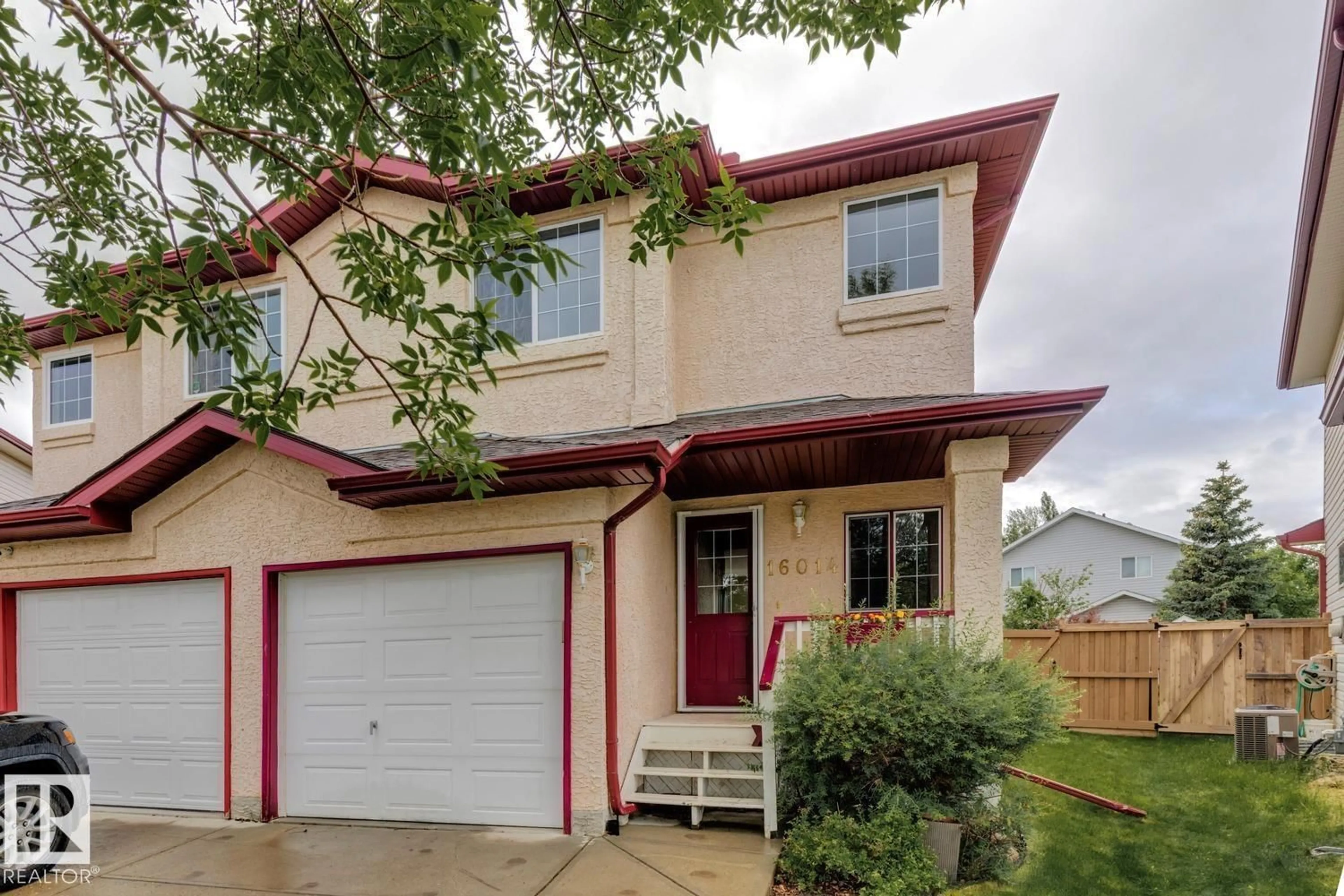Home with vinyl exterior material, street for 16014 90 ST NW, Edmonton Alberta T5Z3P6