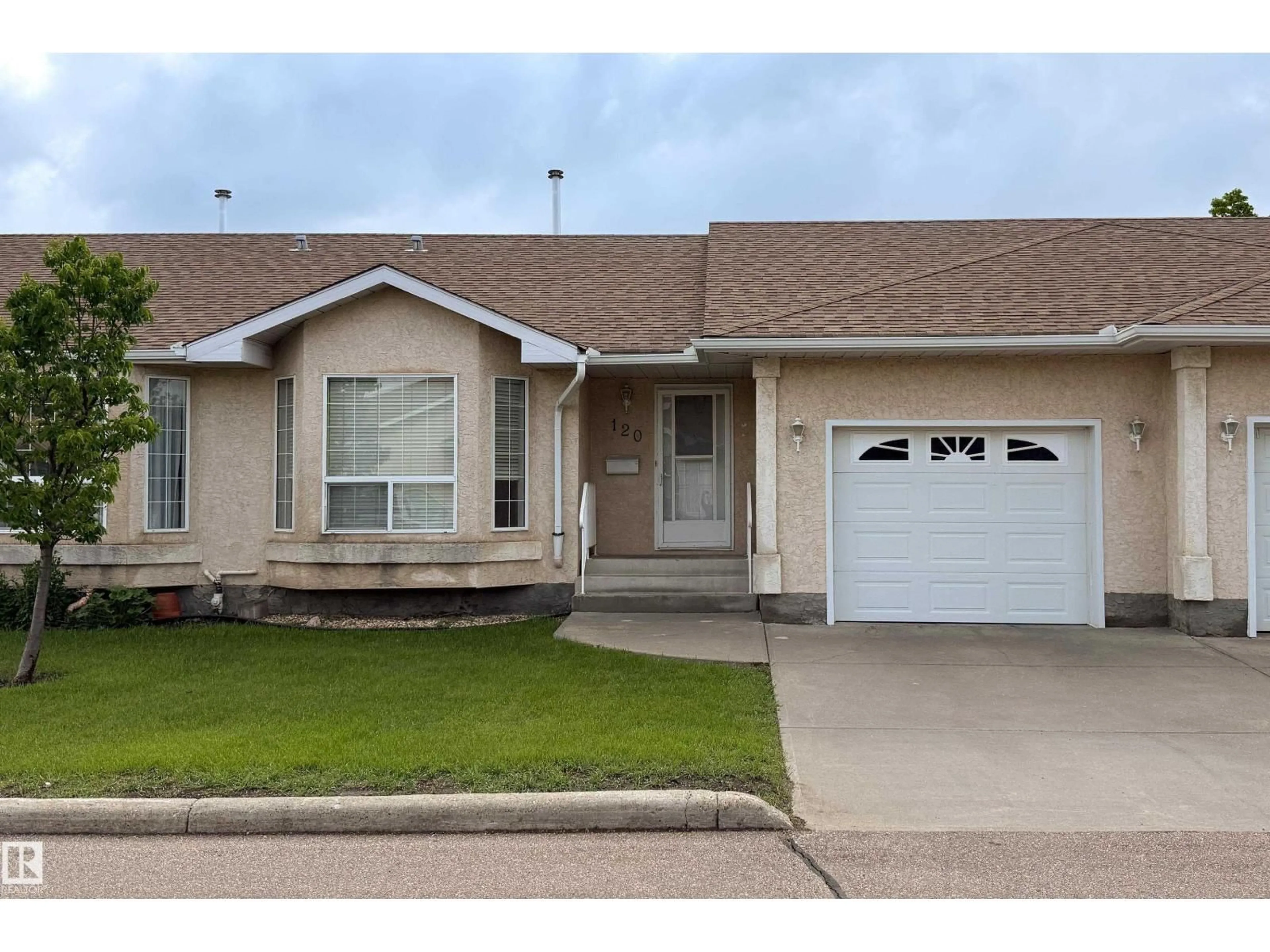 Home with vinyl exterior material, street for 120 13320 124 STREET, Edmonton Alberta T5L5B7