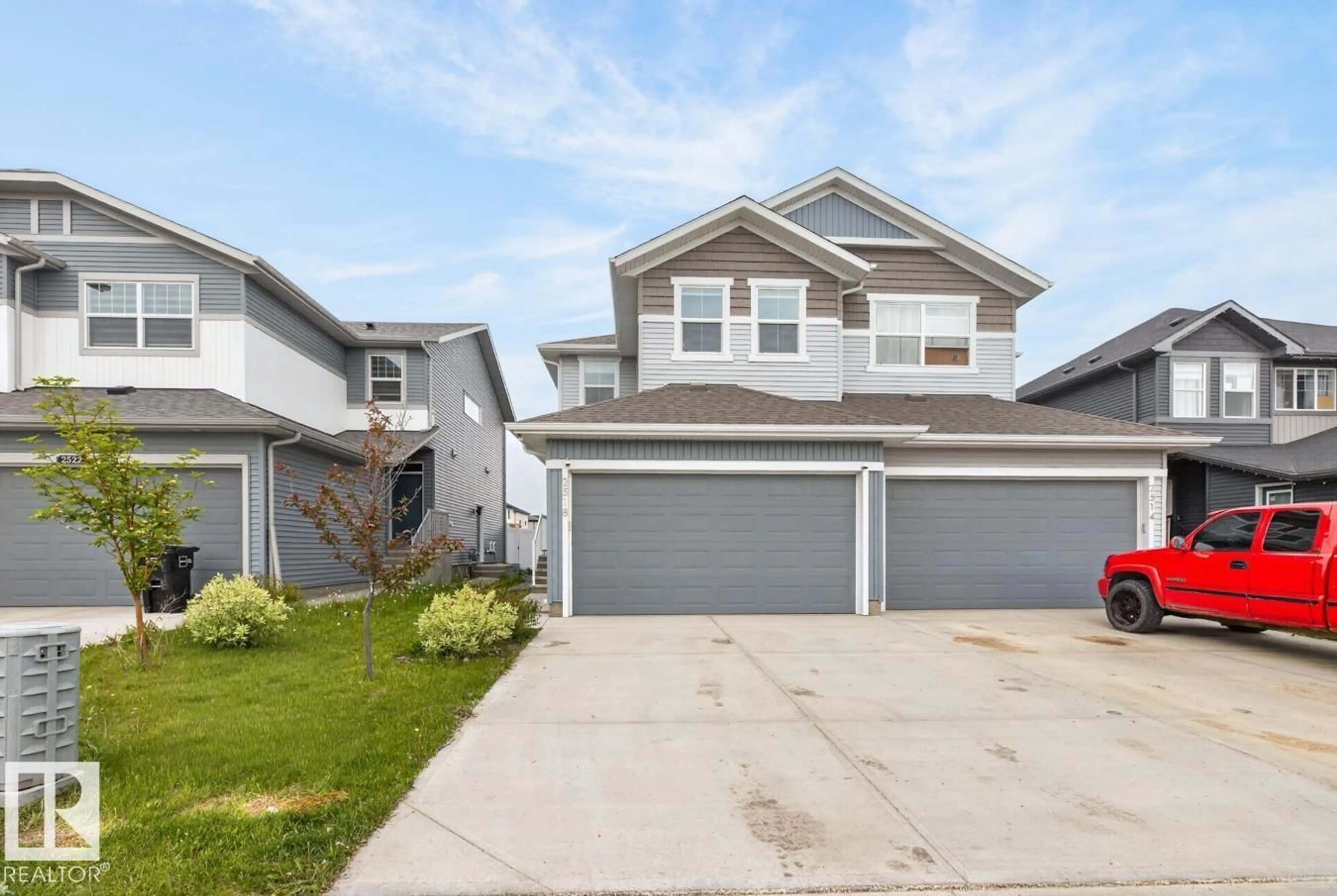 Home with vinyl exterior material, street for 2514 151A AV, Edmonton Alberta T5Y3Z2