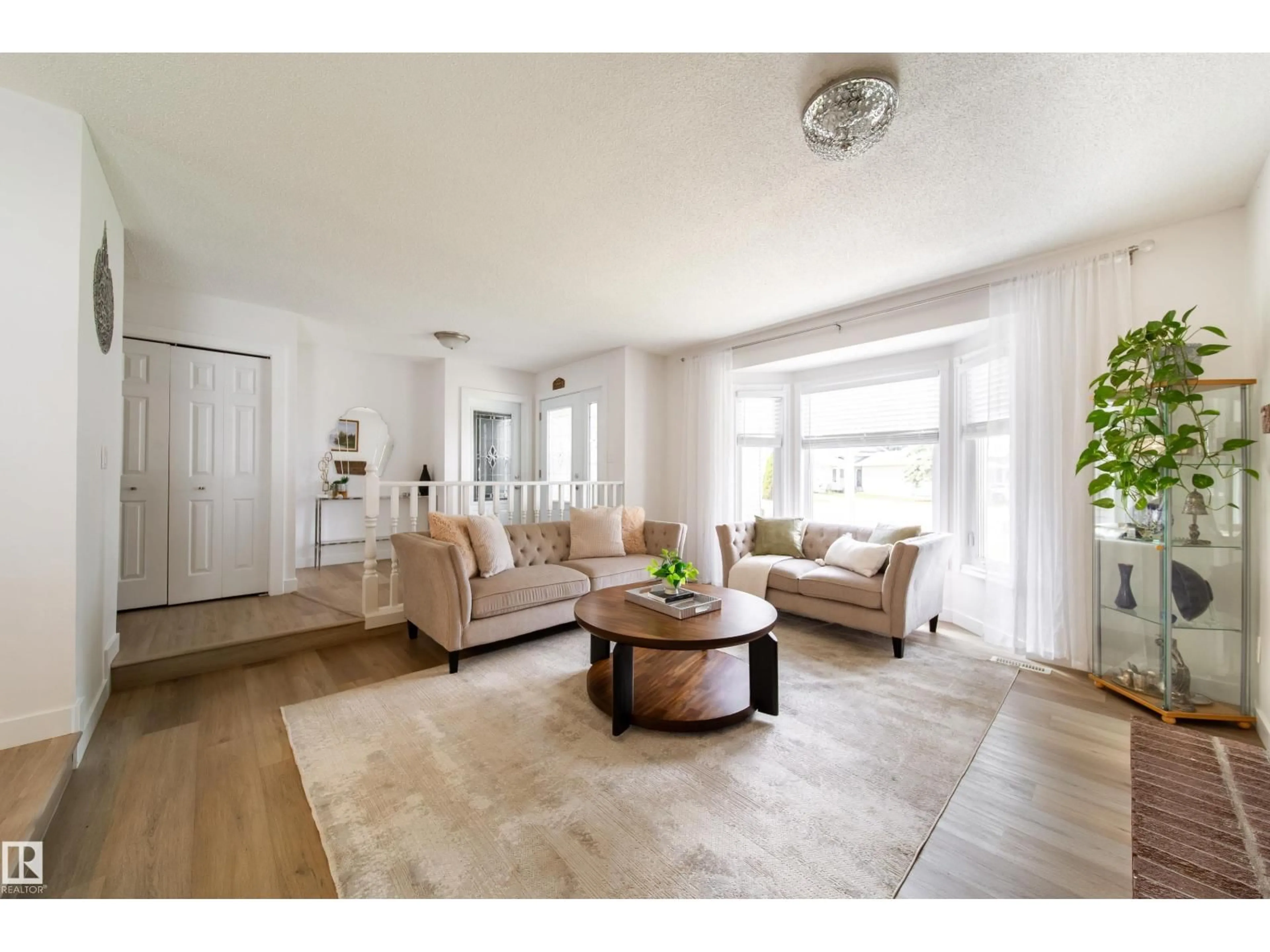 Living room with furniture, unknown for NW - 5607 188A ST, Edmonton Alberta T6M2G7