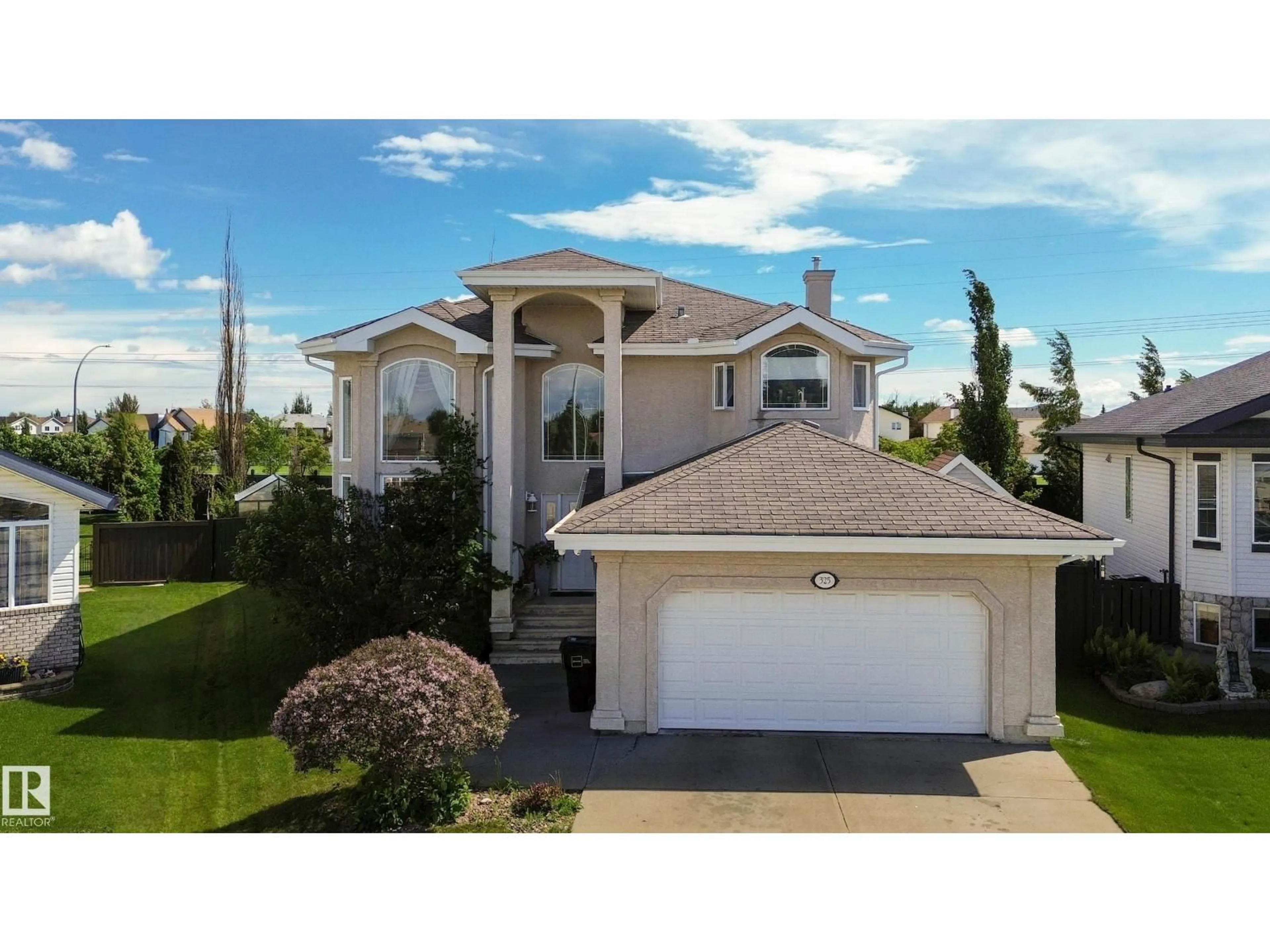 Home with vinyl exterior material, street for 325 CUTTS CO, Edmonton Alberta T6V1M7