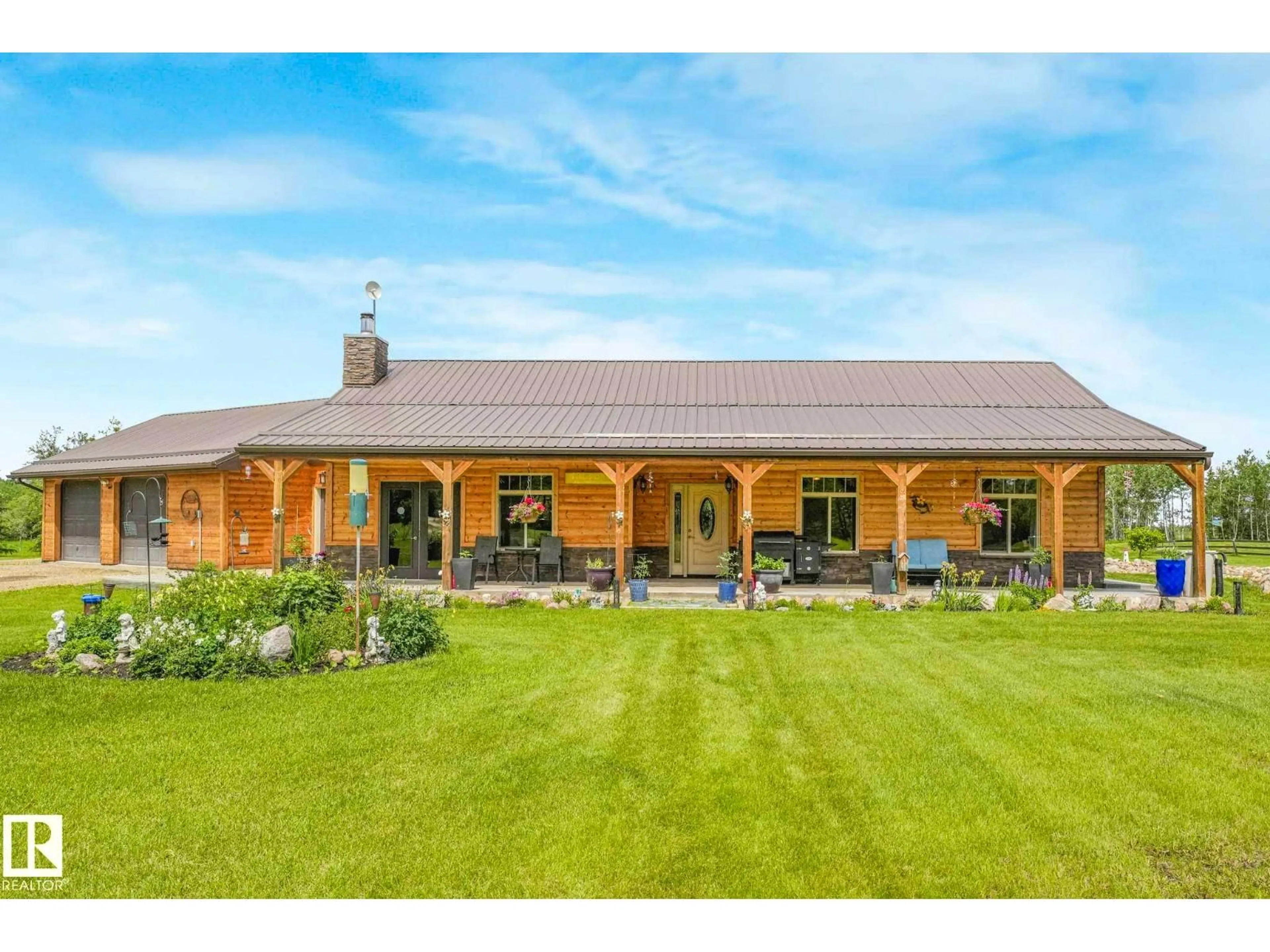 A pic from outside/outdoor area/front of a property/back of a property/a pic from drone, building for 25426 TWP ROAD 602, Rural Westlock County Alberta T7P2P4