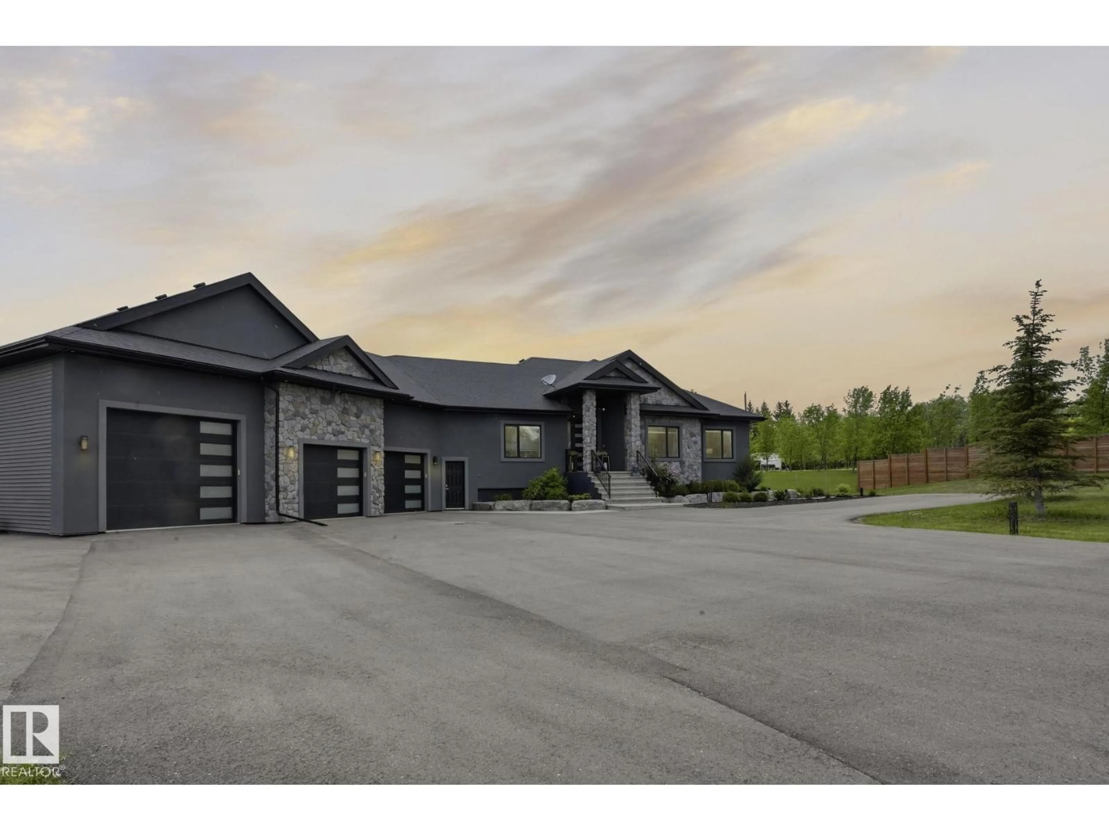 A pic from outside/outdoor area/front of a property/back of a property/a pic from drone, street for 190 50450 RGE RD 222, Rural Leduc County Alberta T0B3M2