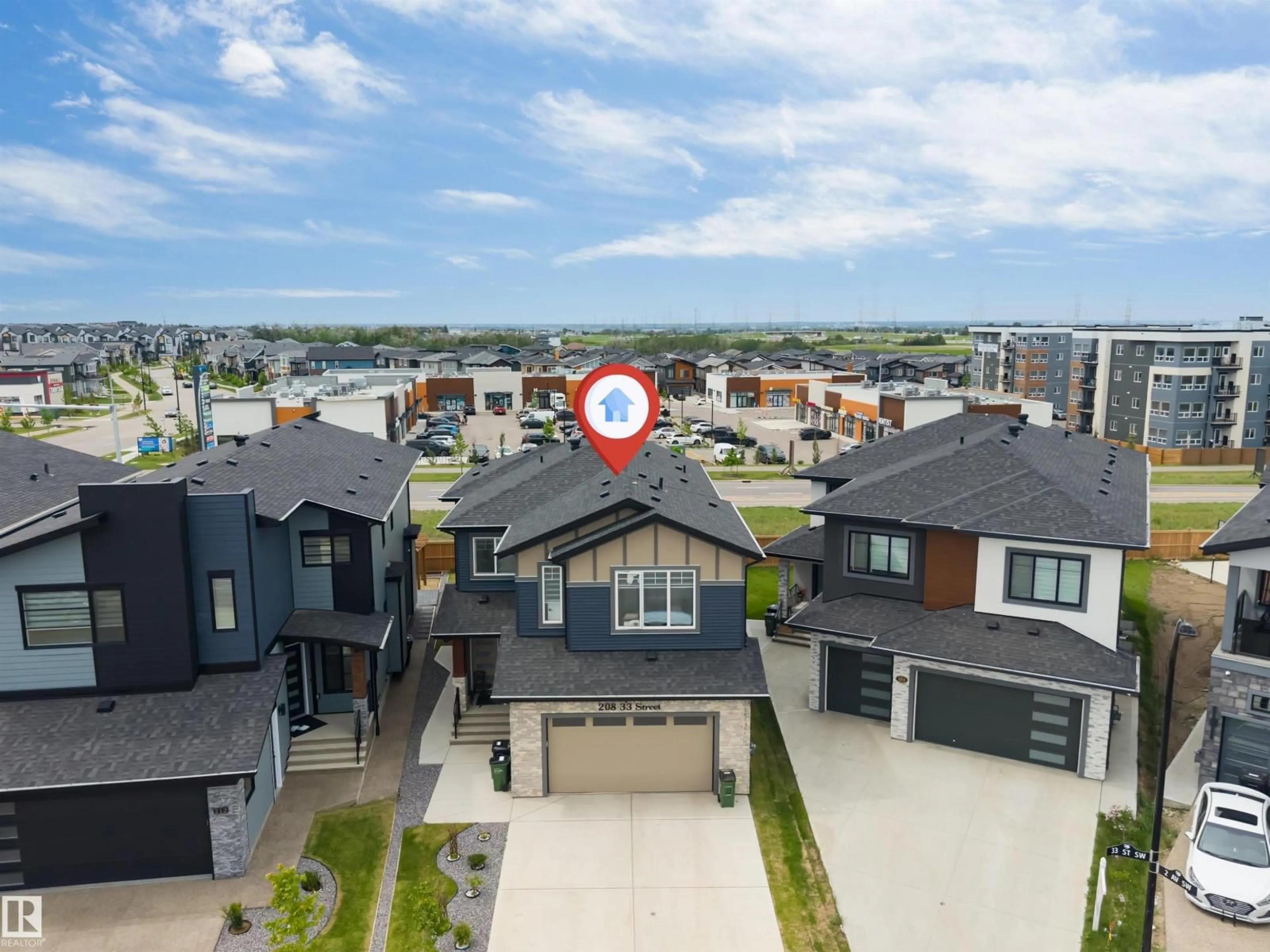 A pic from outside/outdoor area/front of a property/back of a property/a pic from drone, unknown for SW - 208 33 STREET, Edmonton Alberta T6X3C7