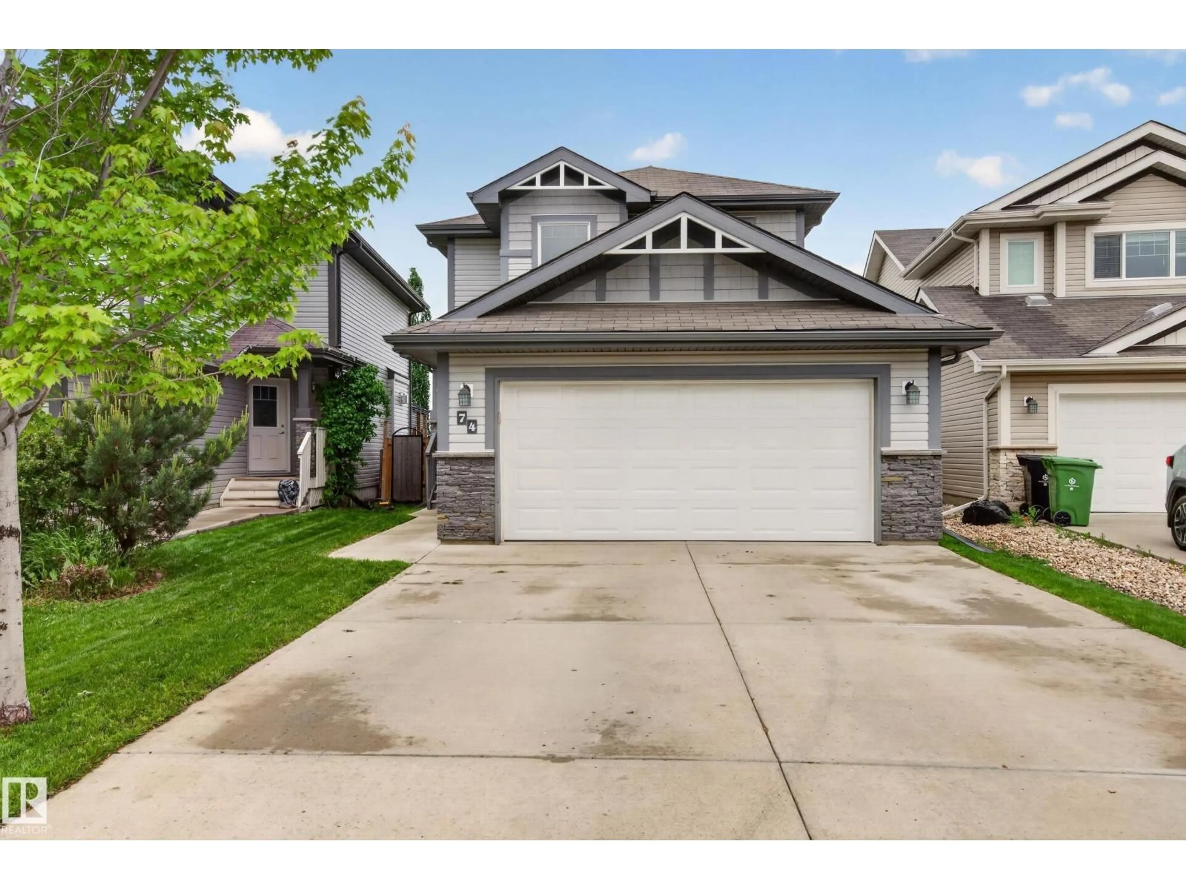 Home with vinyl exterior material, street for 74 SANTANA CR, Fort Saskatchewan Alberta T8L0N8