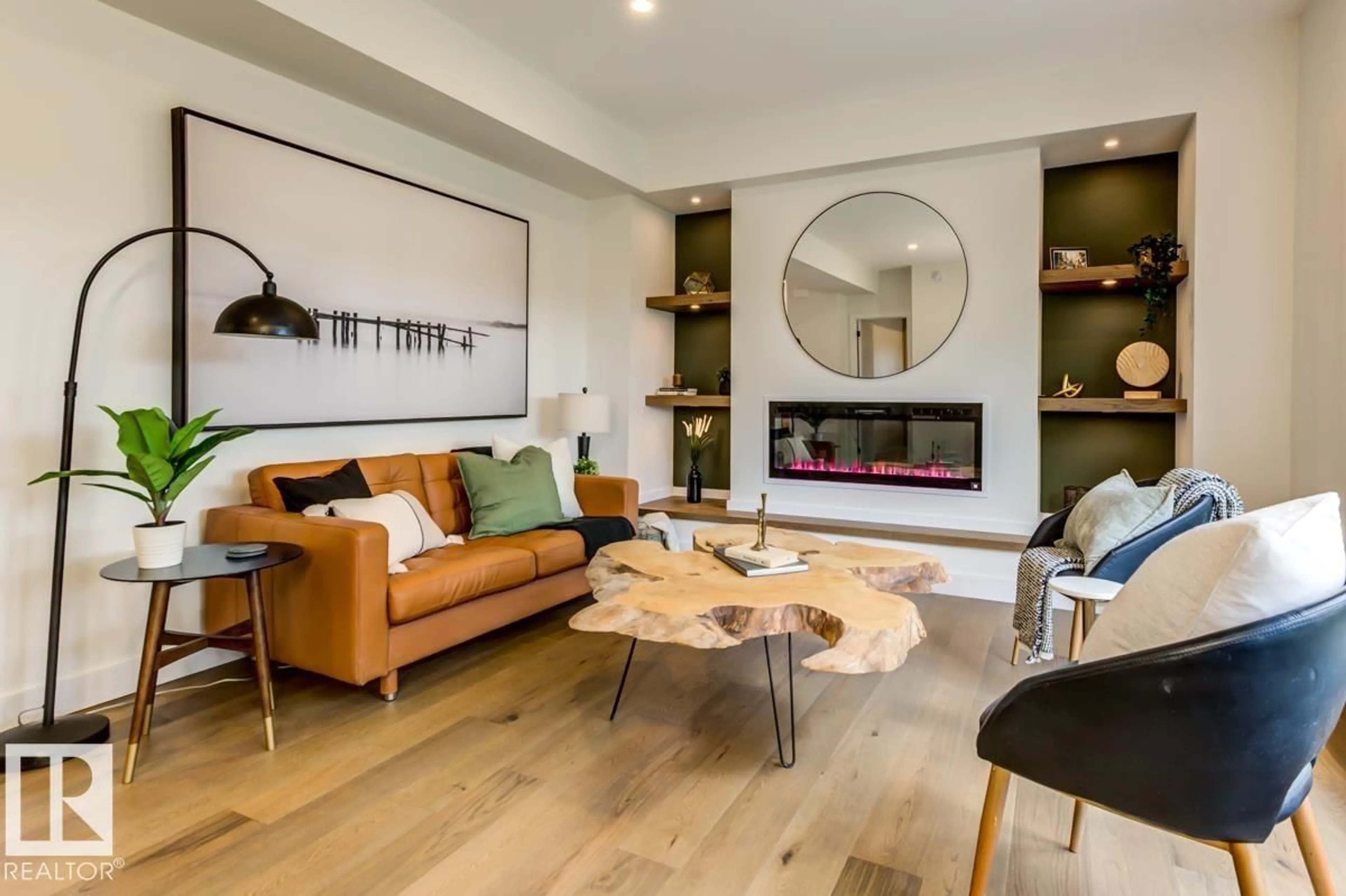 Living room with furniture, wood/laminate floor for 7924 92 AV, Edmonton Alberta T6C1R7