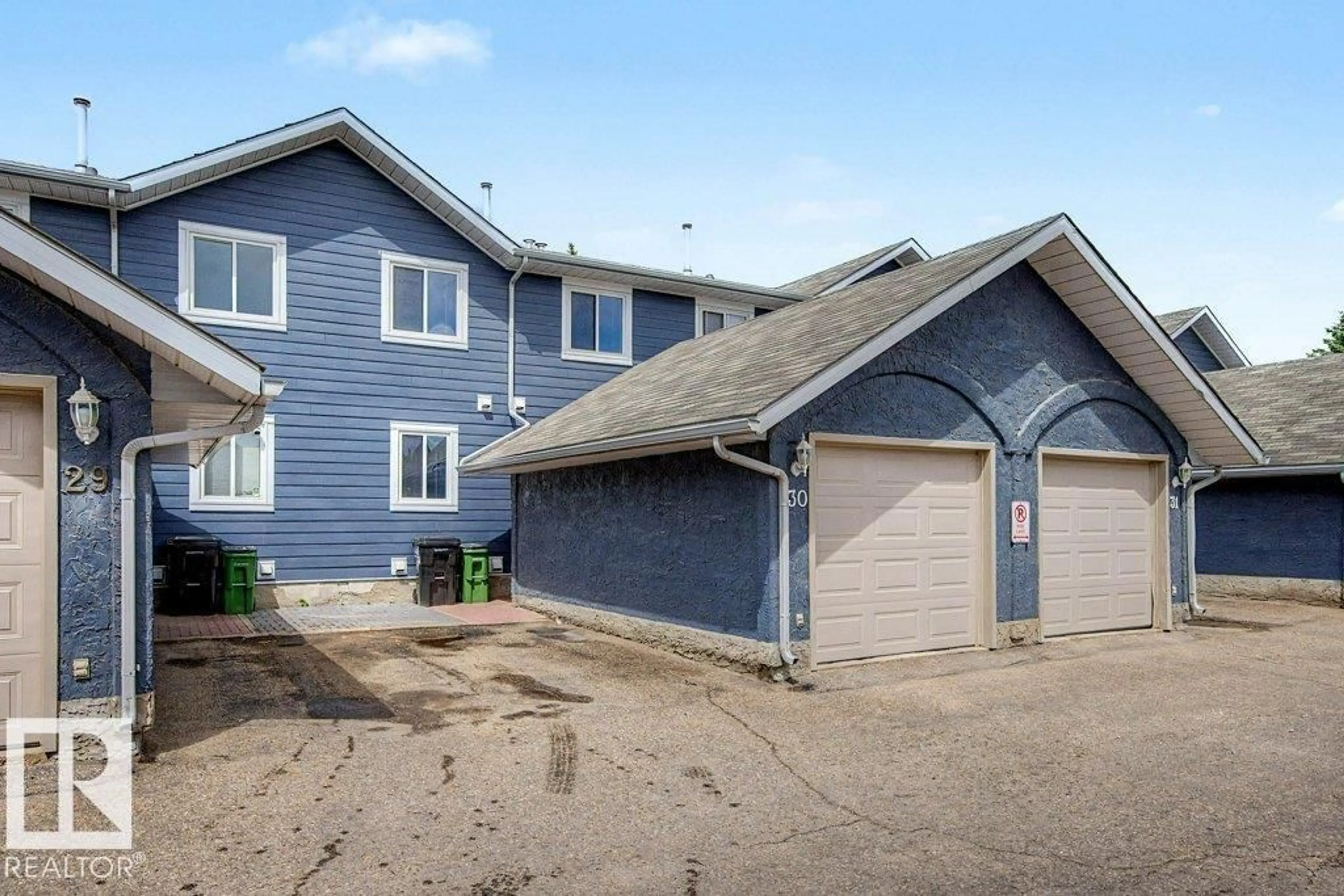 Home with vinyl exterior material, street for 30 14803 34 ST NW, Edmonton Alberta T5Y2L3