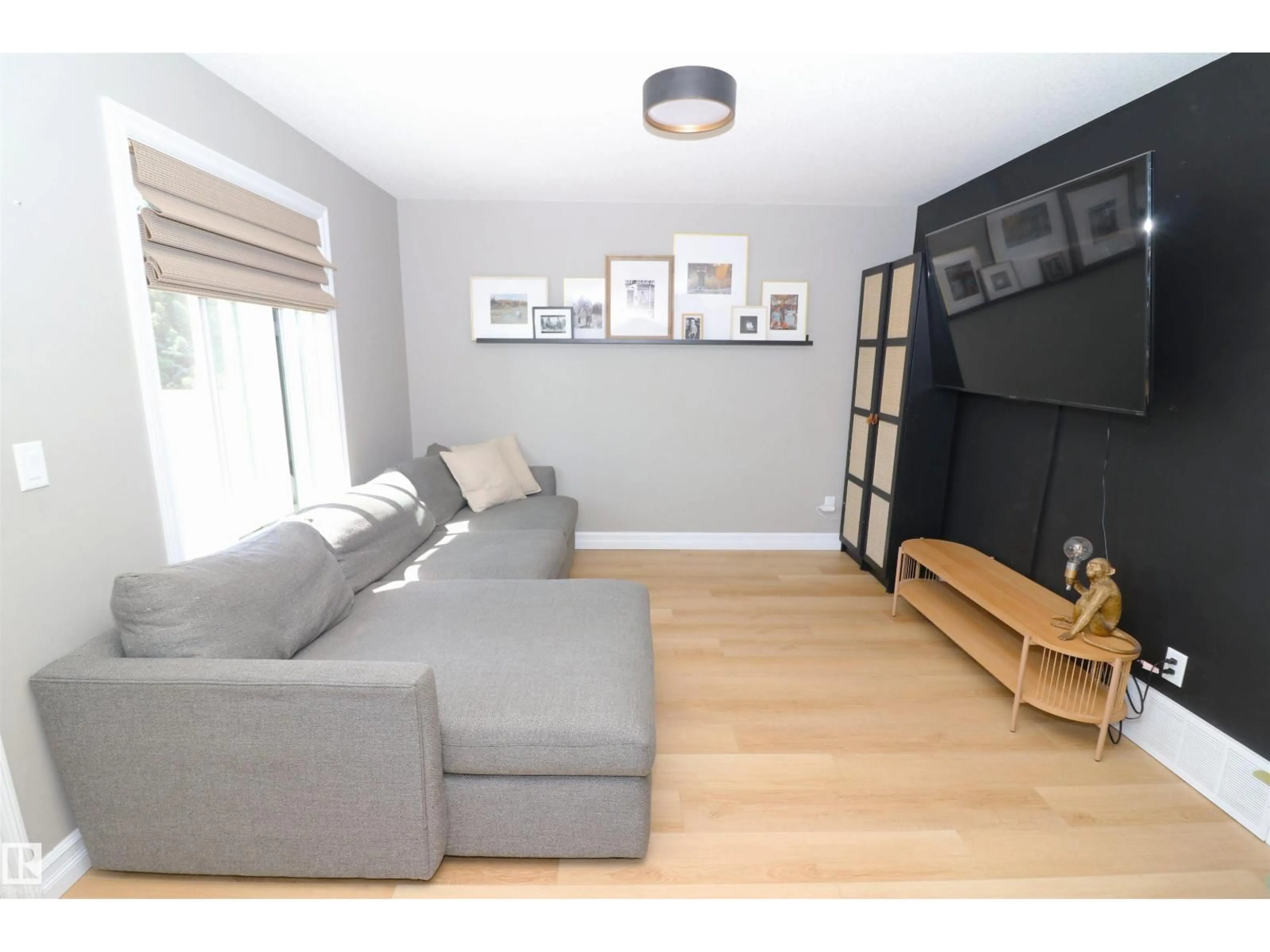 Living room with furniture, wood/laminate floor for #29 - 1508 105 ST NW, Edmonton Alberta T6J5R8