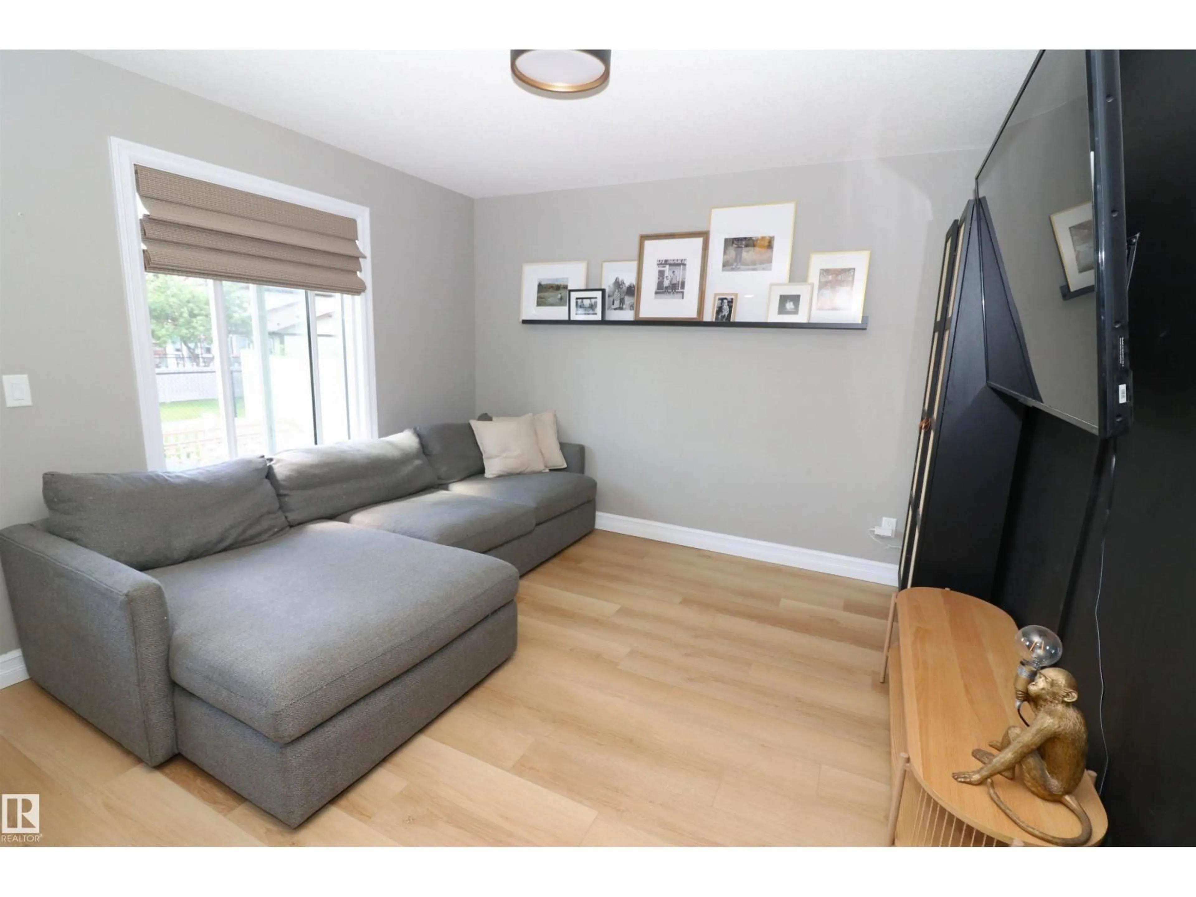 Living room with furniture, wood/laminate floor for #29 - 1508 105 ST NW, Edmonton Alberta T6J5R8