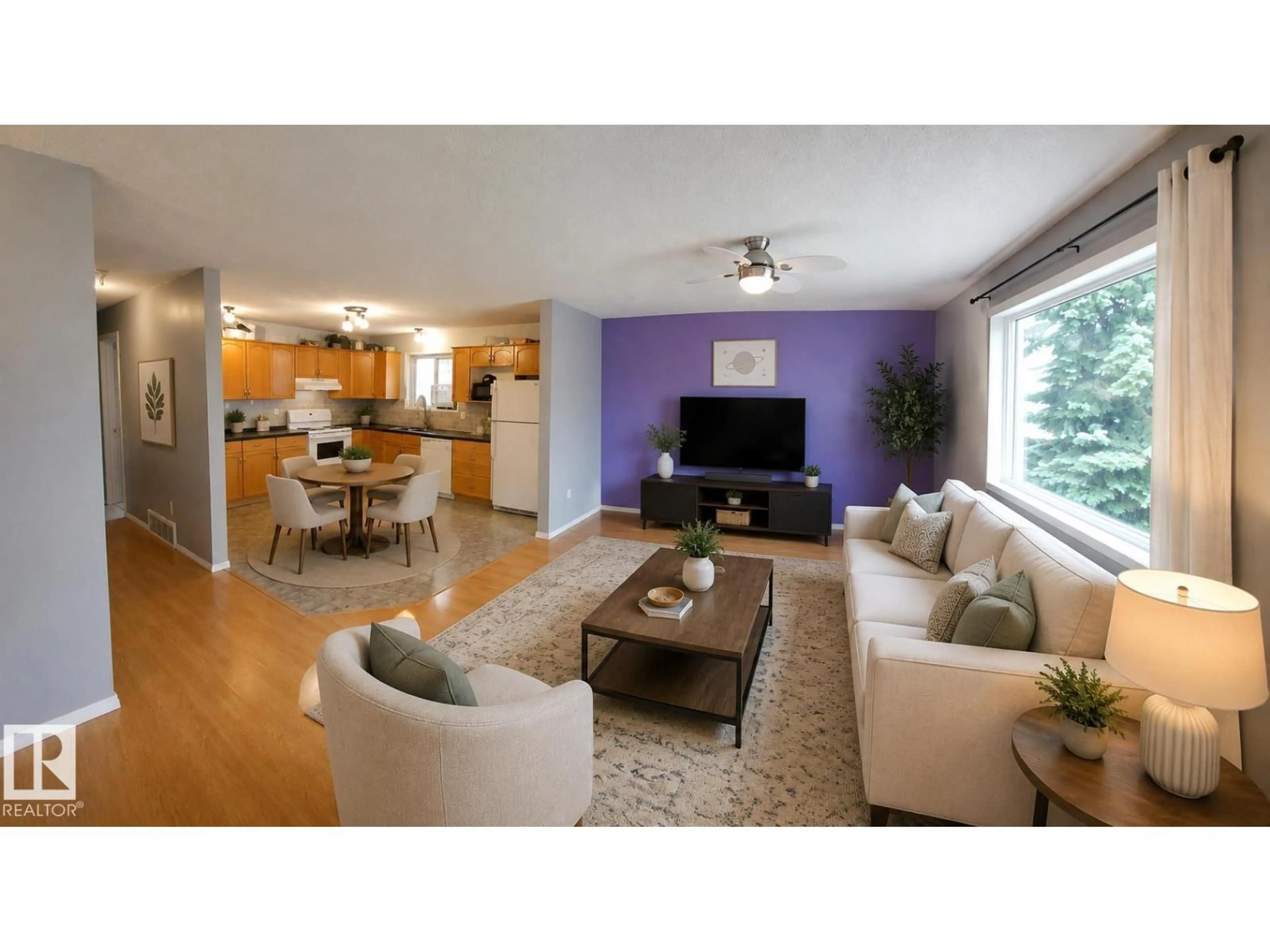 Living room with furniture, wood/laminate floor for 5826 49 ST, Tofield Alberta T0B4J0