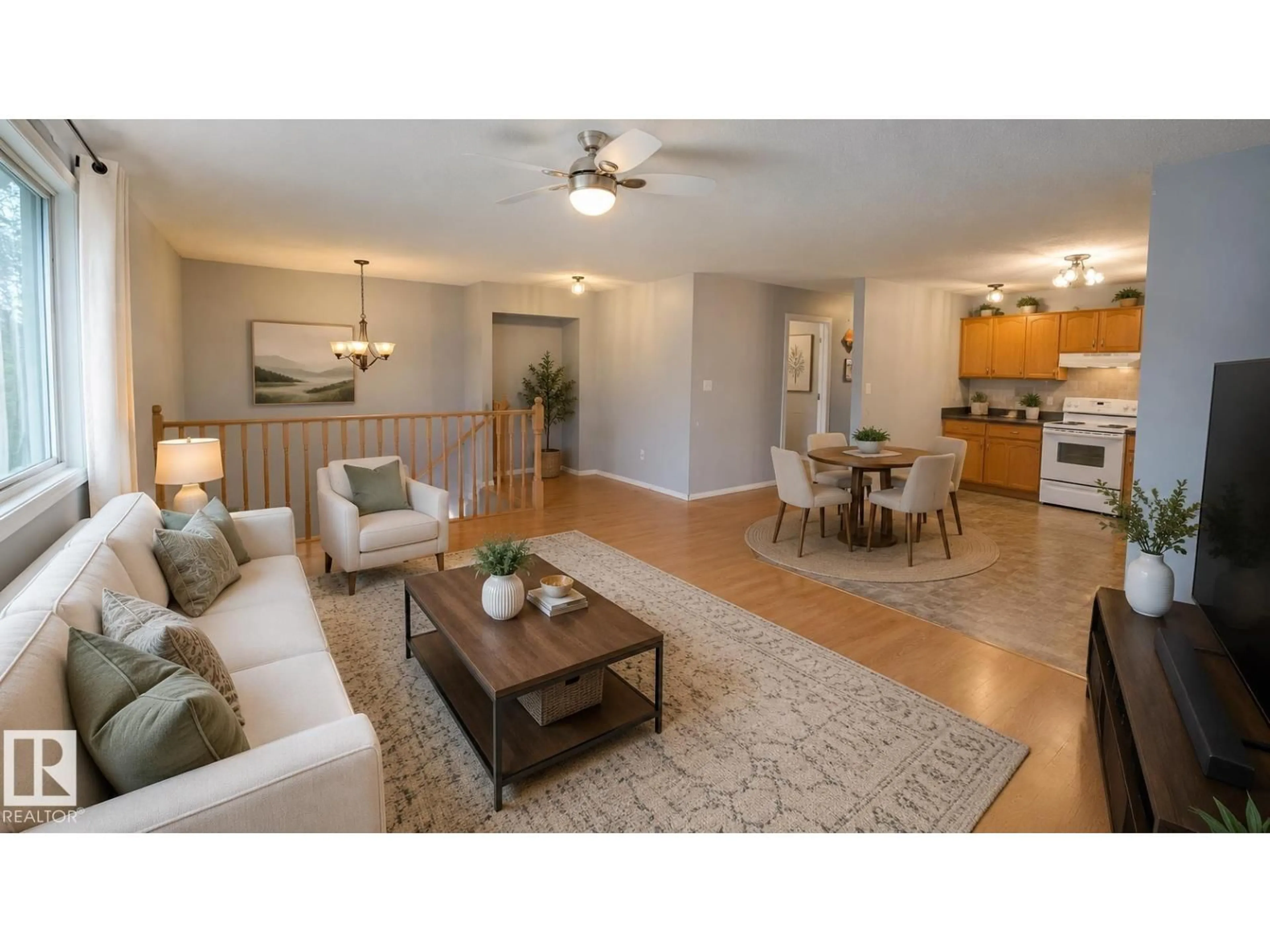 Living room with furniture, wood/laminate floor for 5826 49 ST, Tofield Alberta T0B4J0