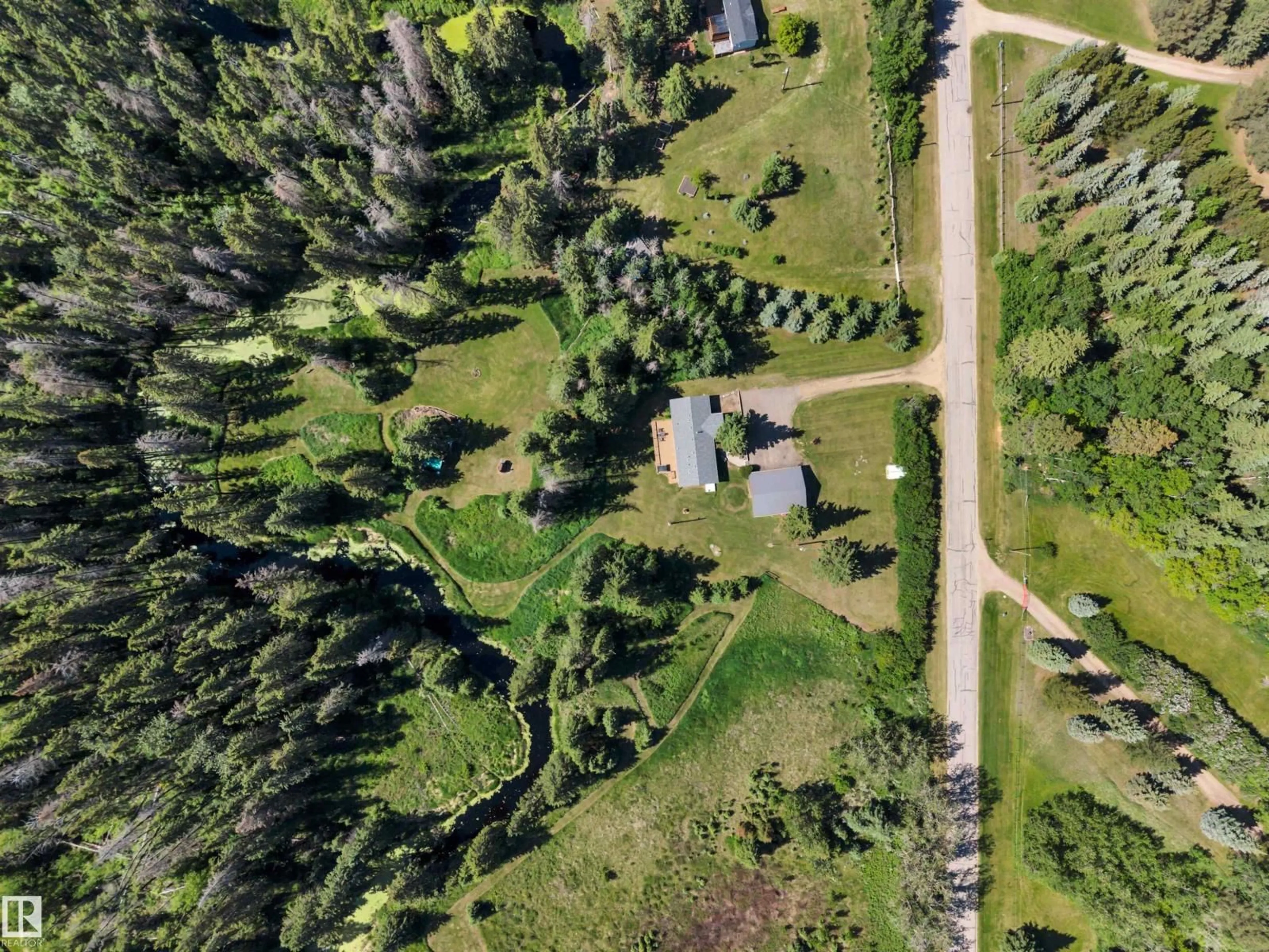 A pic from outside/outdoor area/front of a property/back of a property/a pic from drone, forest/trees view for 473058 RGE ROAD 243 A, Rural Wetaskiwin County Alberta T0C1Z0