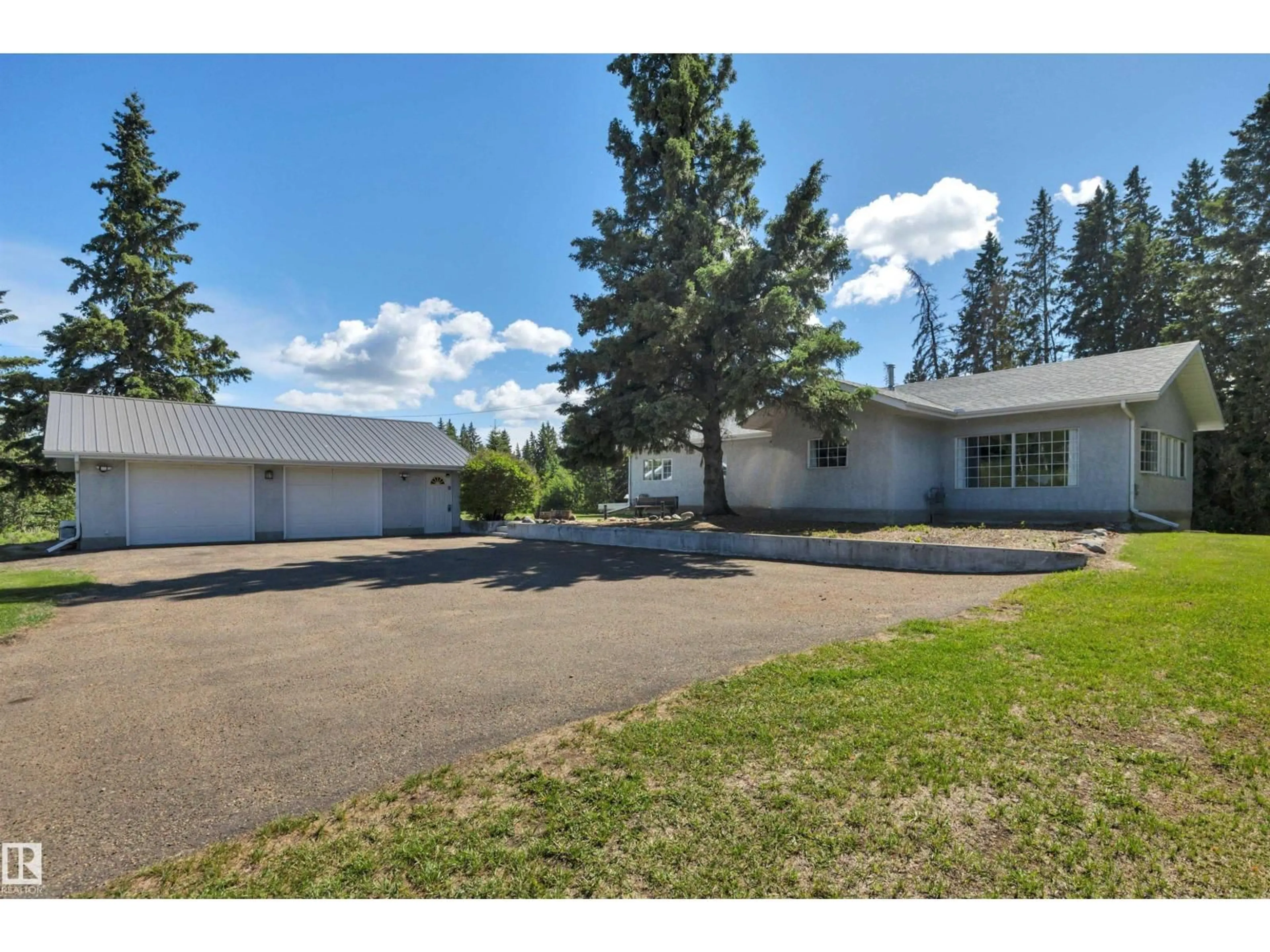 A pic from outside/outdoor area/front of a property/back of a property/a pic from drone, street for 473058 RGE ROAD 243 A, Rural Wetaskiwin County Alberta T0C1Z0