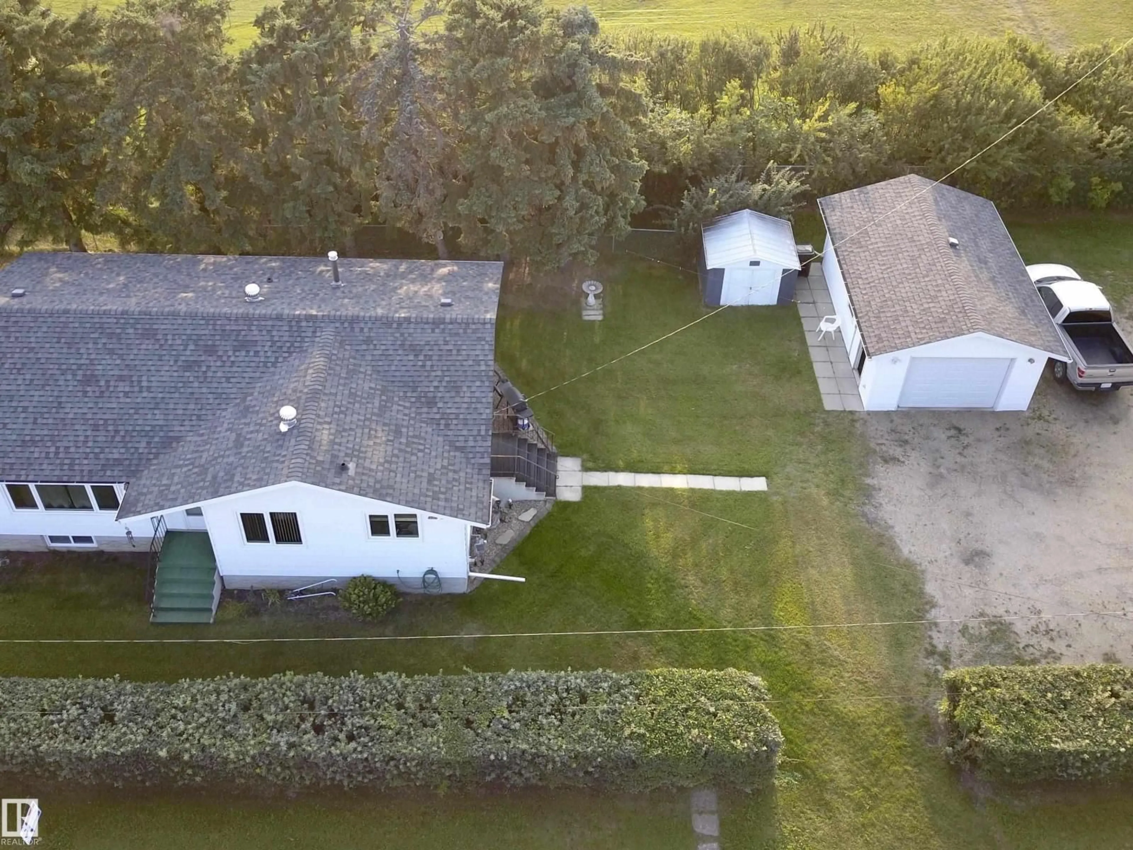 A pic from outside/outdoor area/front of a property/back of a property/a pic from drone, water/lake/river/ocean view for 5530 46 STREET, Barrhead Alberta T7N1K6