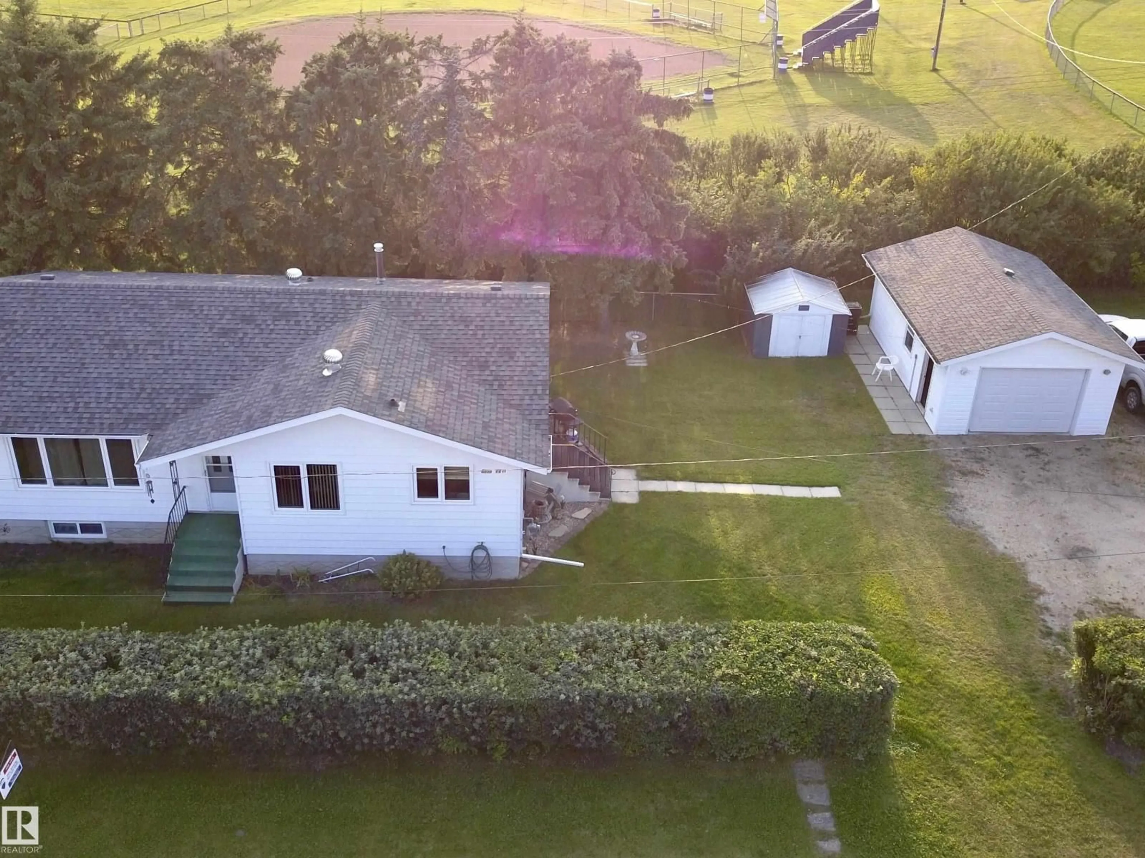 A pic from outside/outdoor area/front of a property/back of a property/a pic from drone, building for 5530 46 STREET, Barrhead Alberta T7N1K6