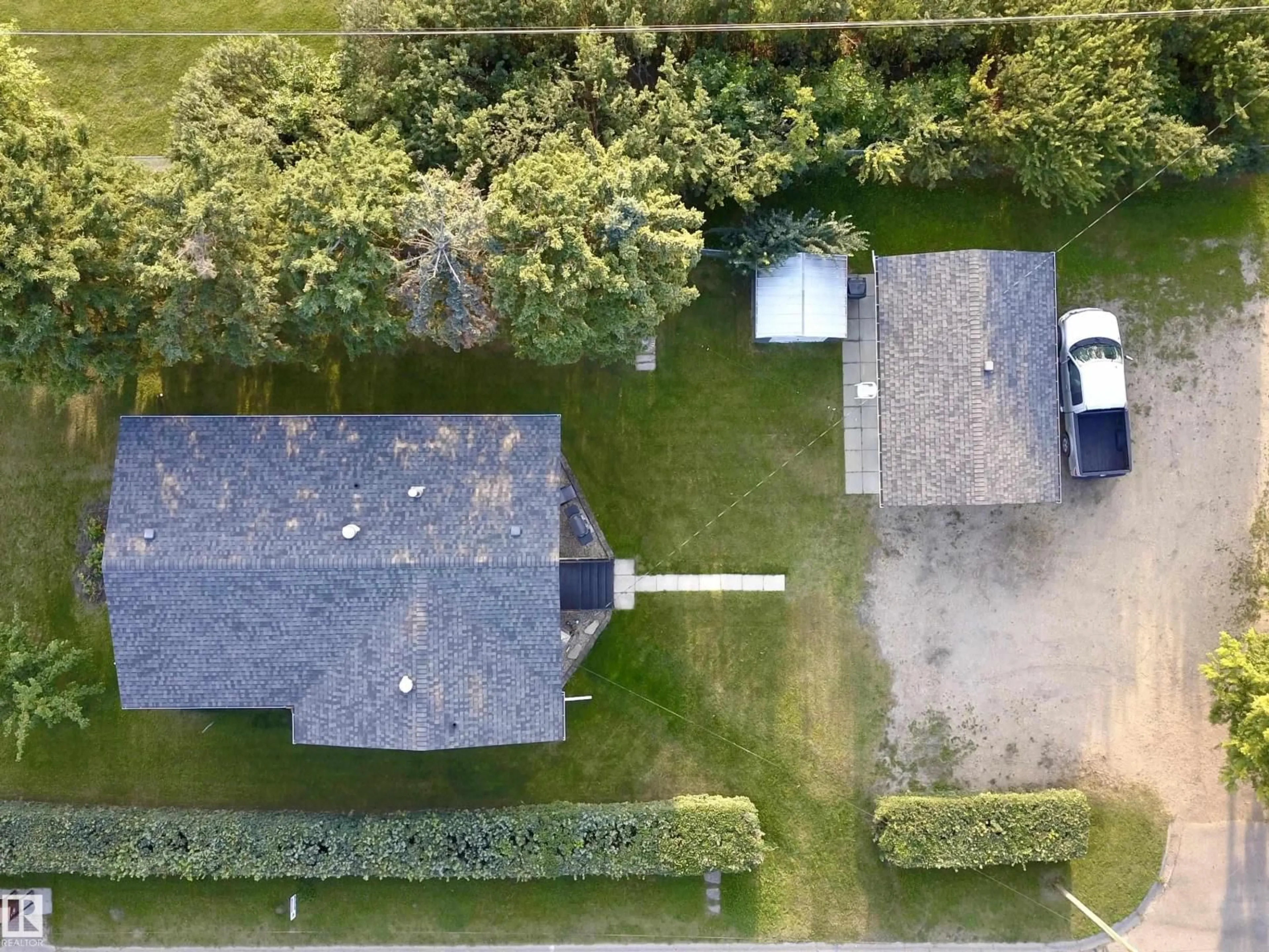 A pic from outside/outdoor area/front of a property/back of a property/a pic from drone, street for 5530 46 STREET, Barrhead Alberta T7N1K6