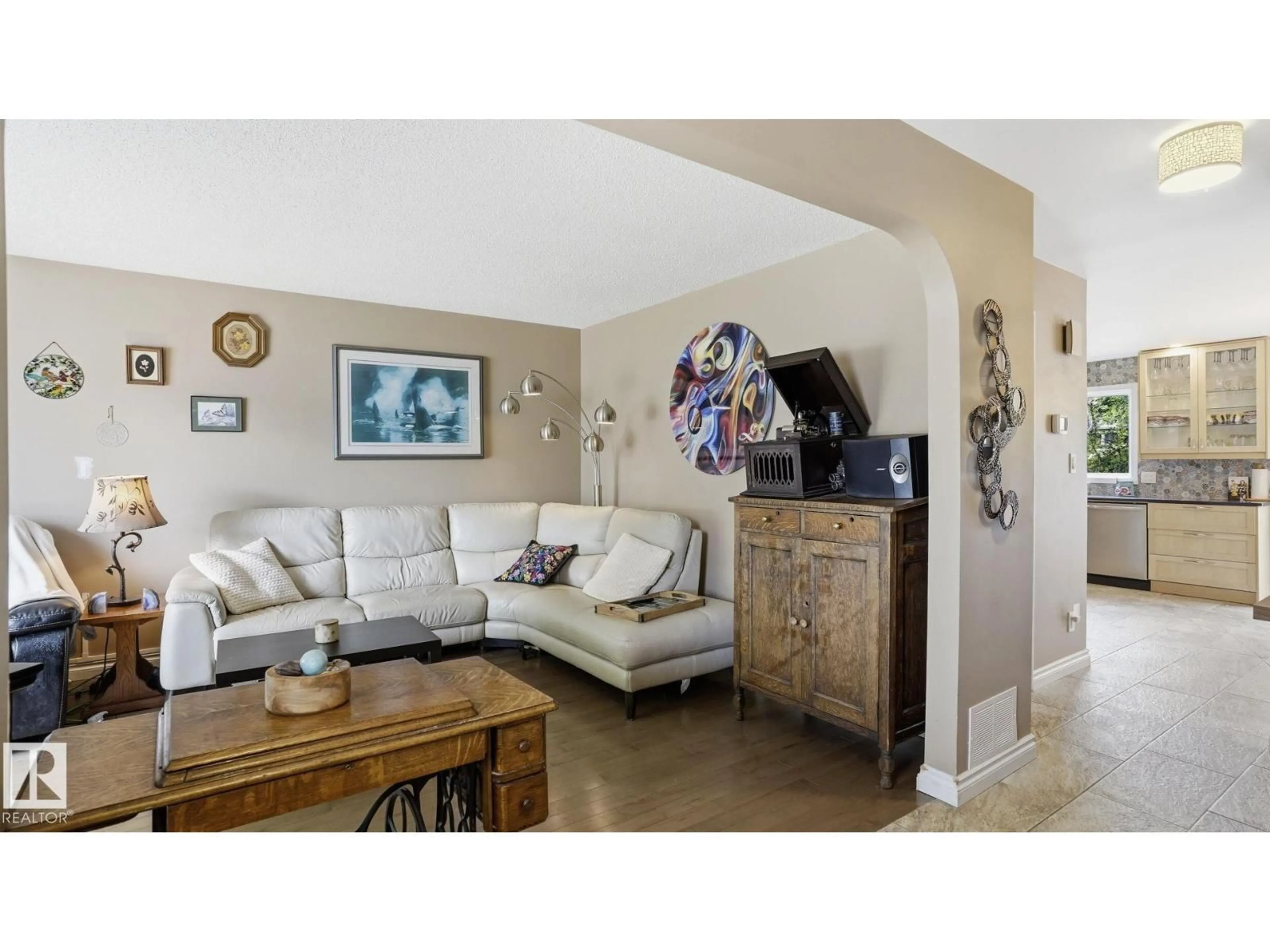 Living room with furniture, ceramic/tile floor for 1827 36 ST, Edmonton Alberta T6L3M9