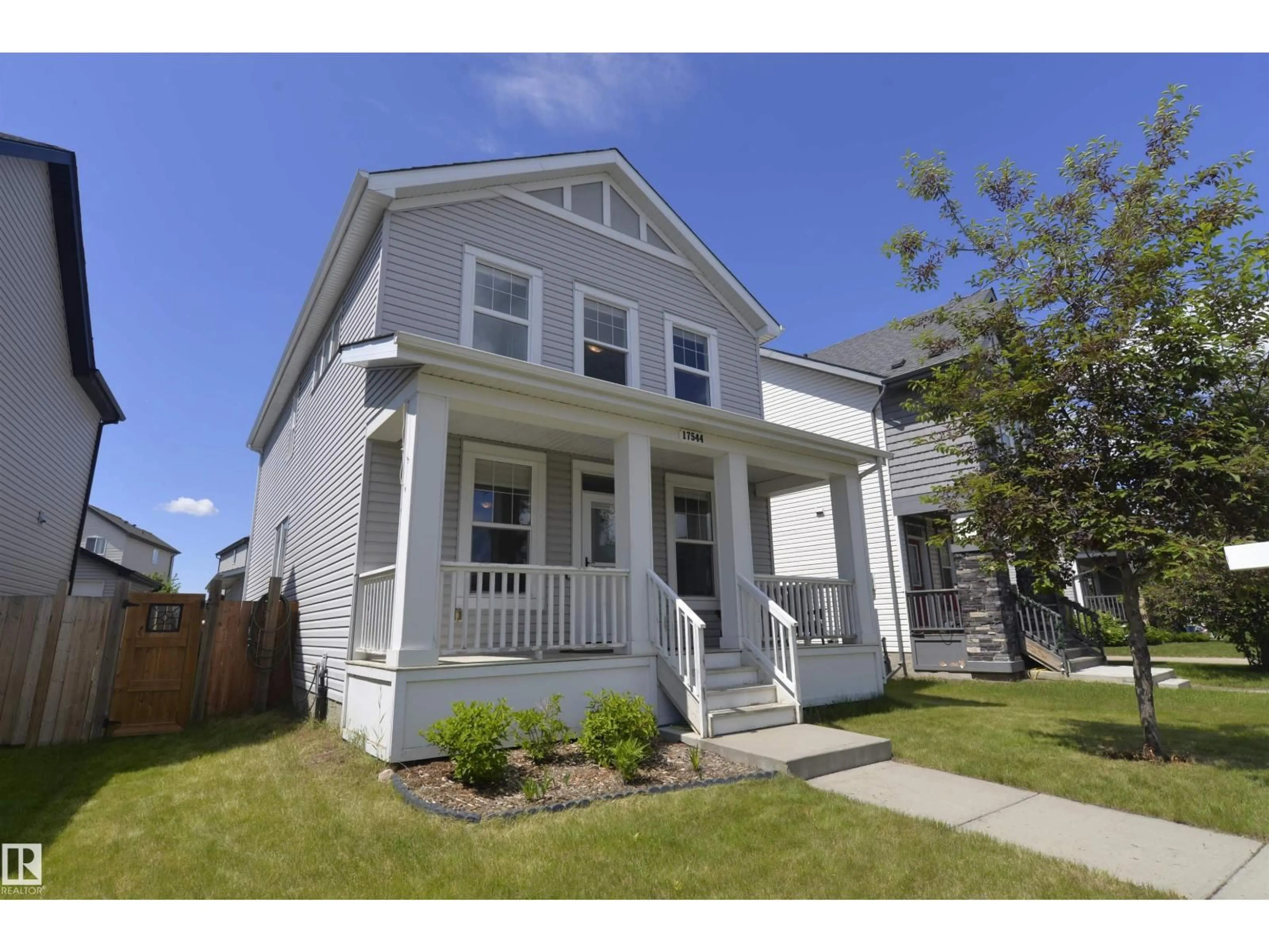 Home with vinyl exterior material, street for NW - 17544 58 ST, Edmonton Alberta T5Y0T7