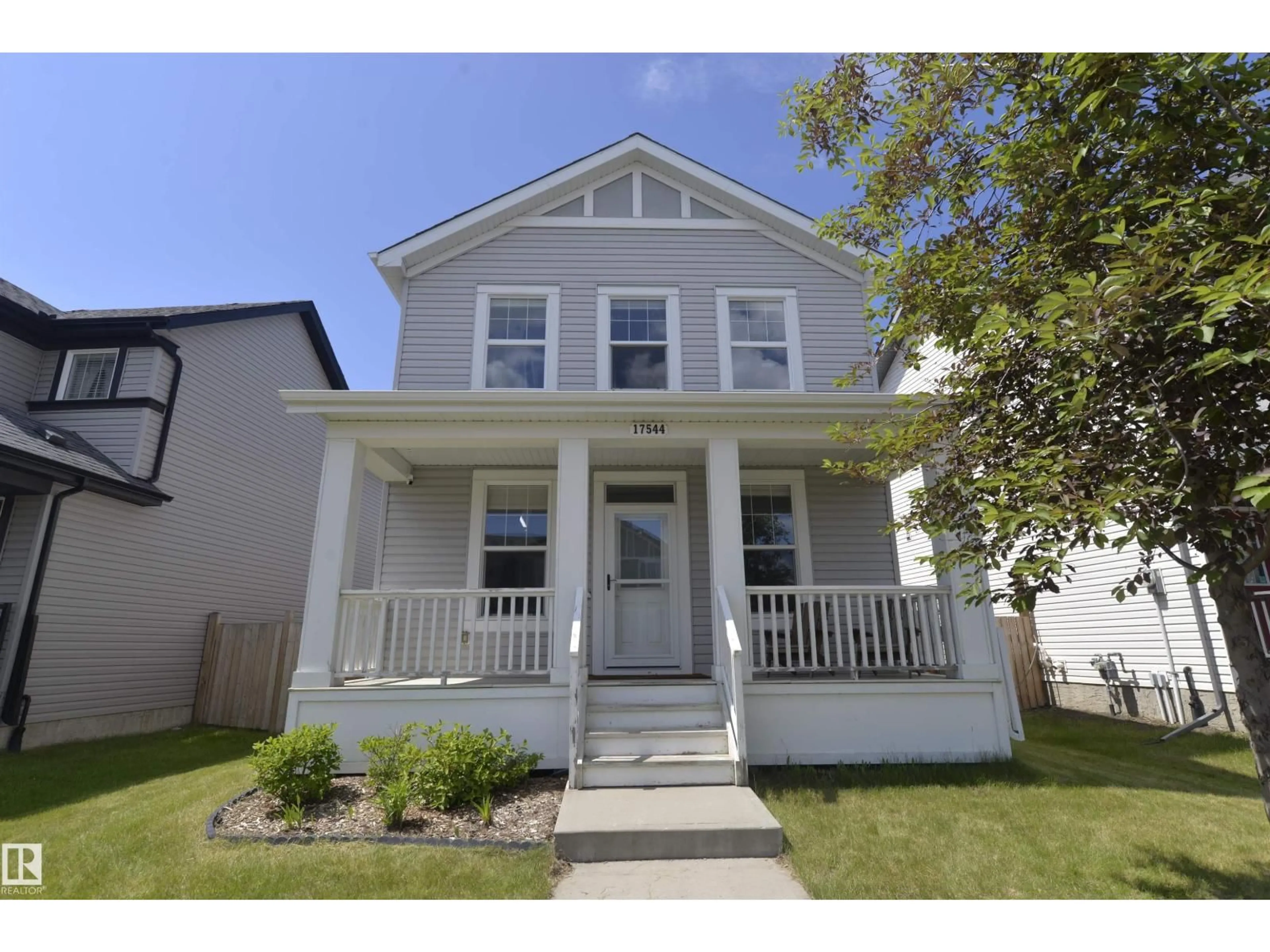 Home with vinyl exterior material, street for NW - 17544 58 ST, Edmonton Alberta T5Y0T7