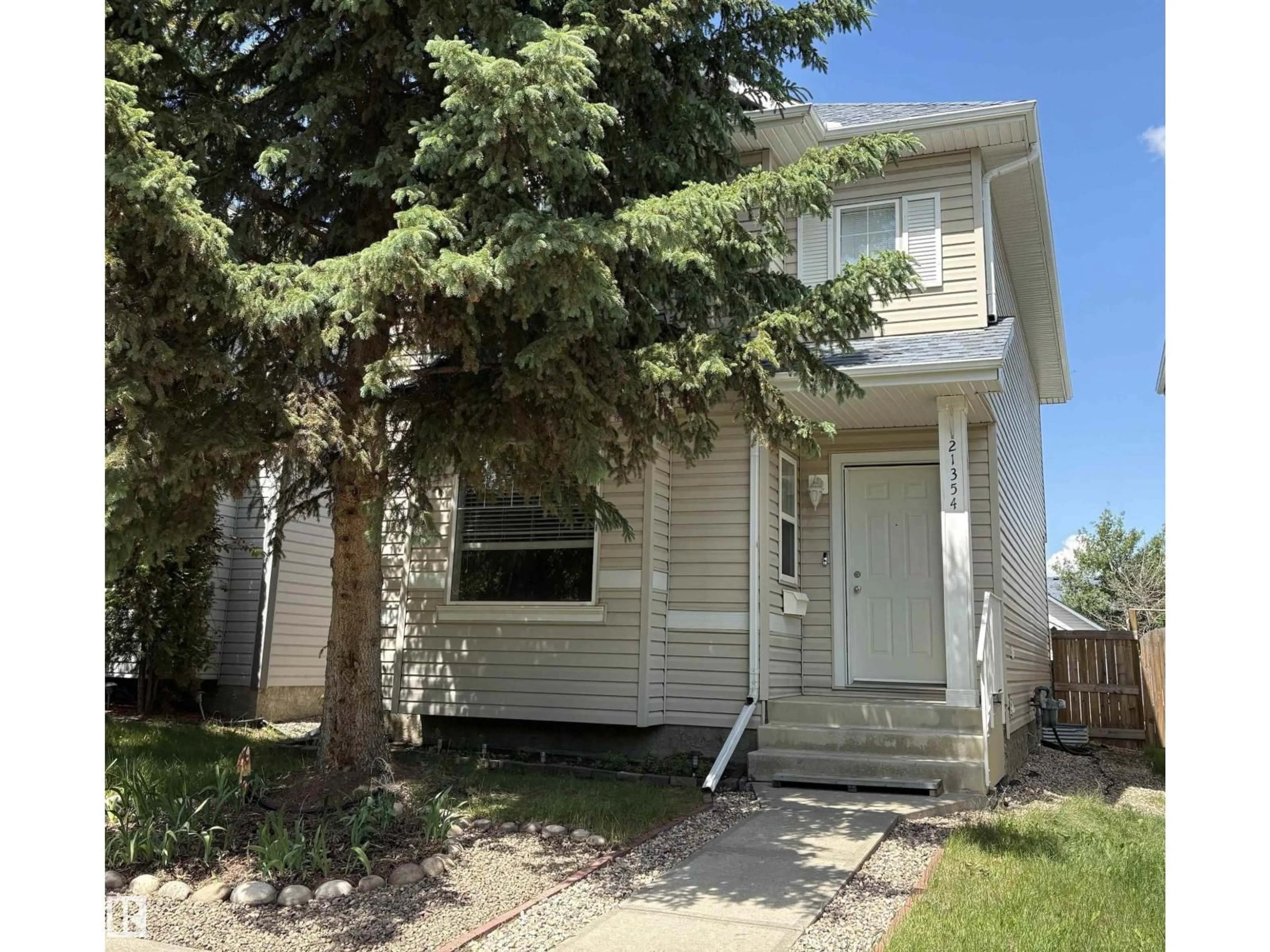 Home with vinyl exterior material, street for 21354 87A AV, Edmonton Alberta T5T6T8