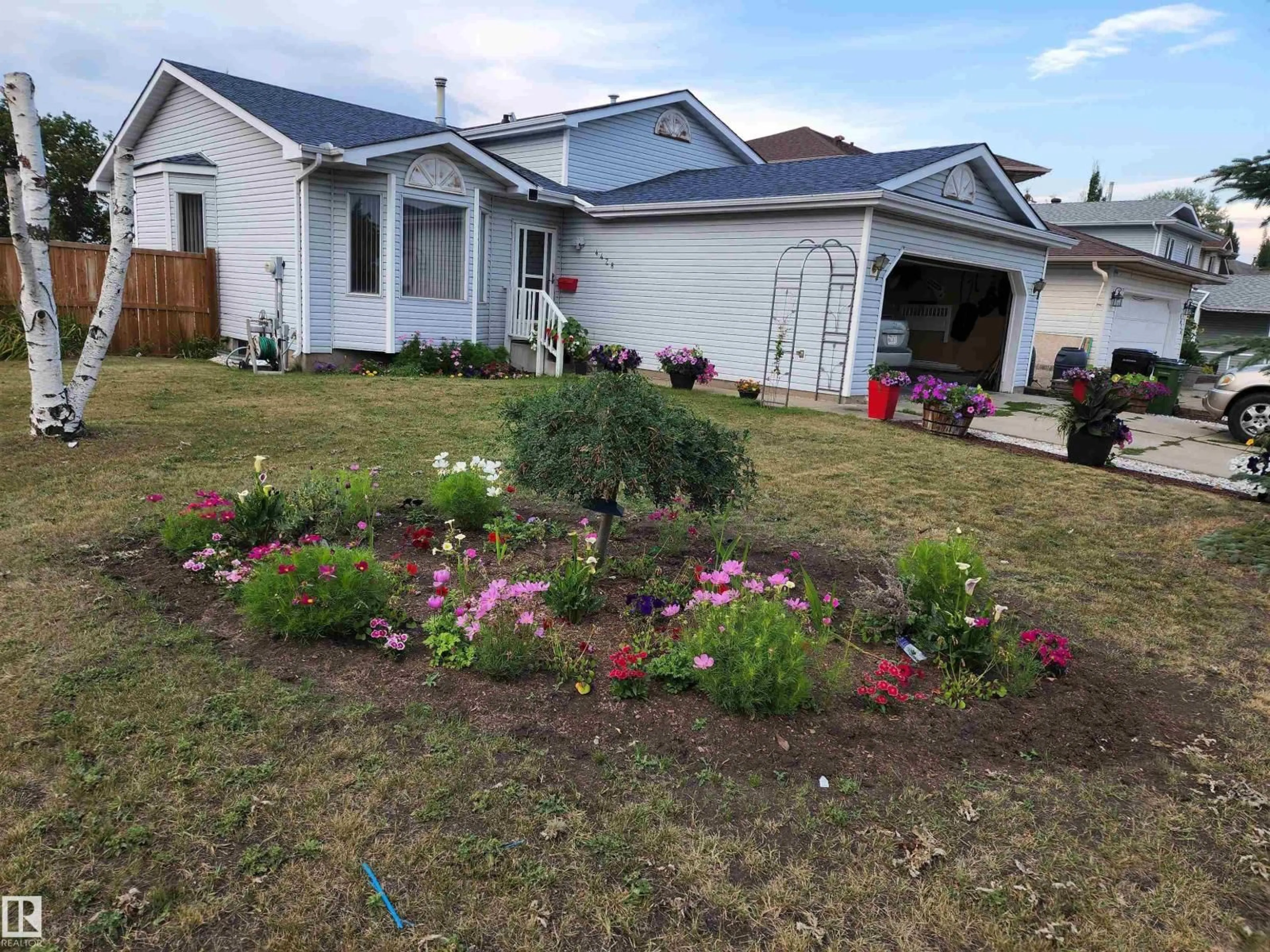 A pic from outside/outdoor area/front of a property/back of a property/a pic from drone, unknown for 4428 11A AV NW, Edmonton Alberta T6L6M4