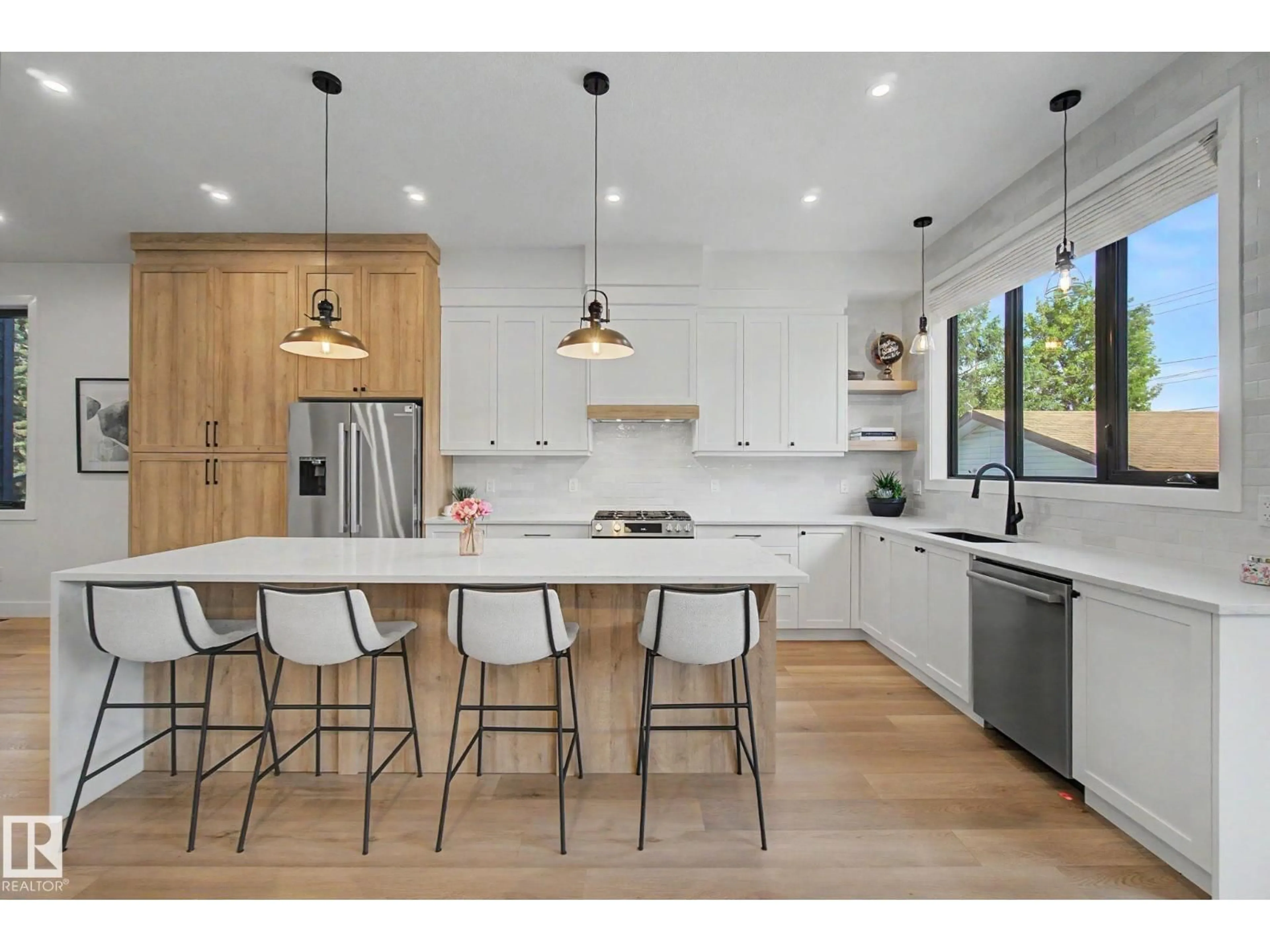 Open concept kitchen, wood/laminate floor for NW - 14711 88 AV, Edmonton Alberta T5R4J9