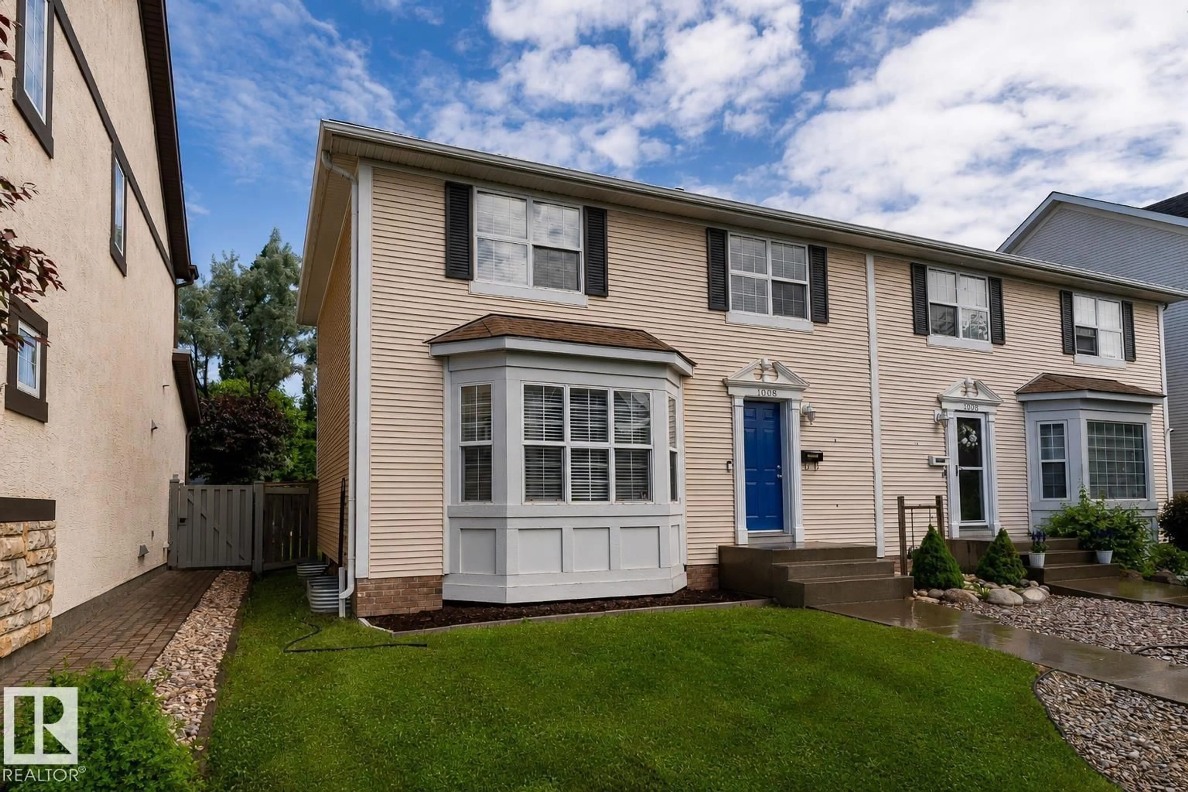 Home with vinyl exterior material, street for 10008 144 AVE, Edmonton Alberta T5E6M5