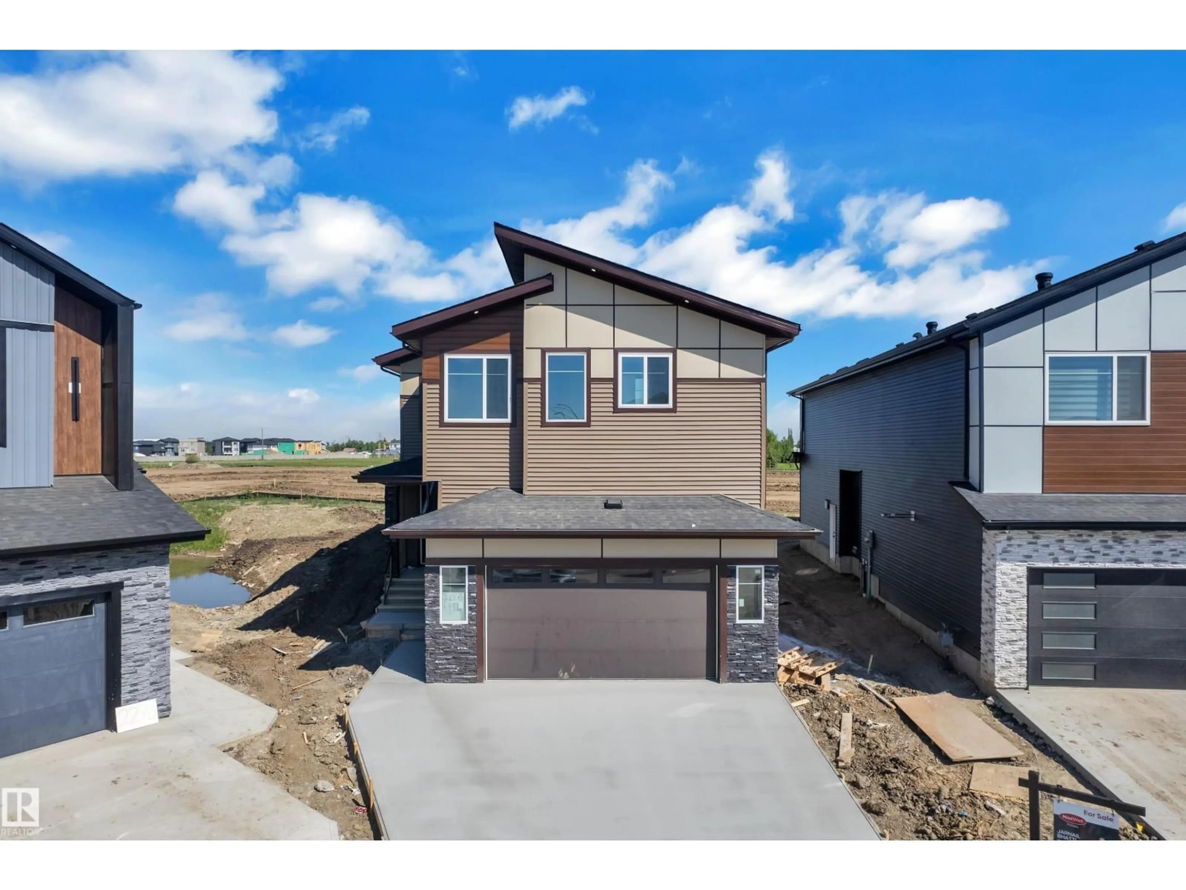 Home with vinyl exterior material, street for 2282 63 AV, Rural Leduc County Alberta T4X0K5