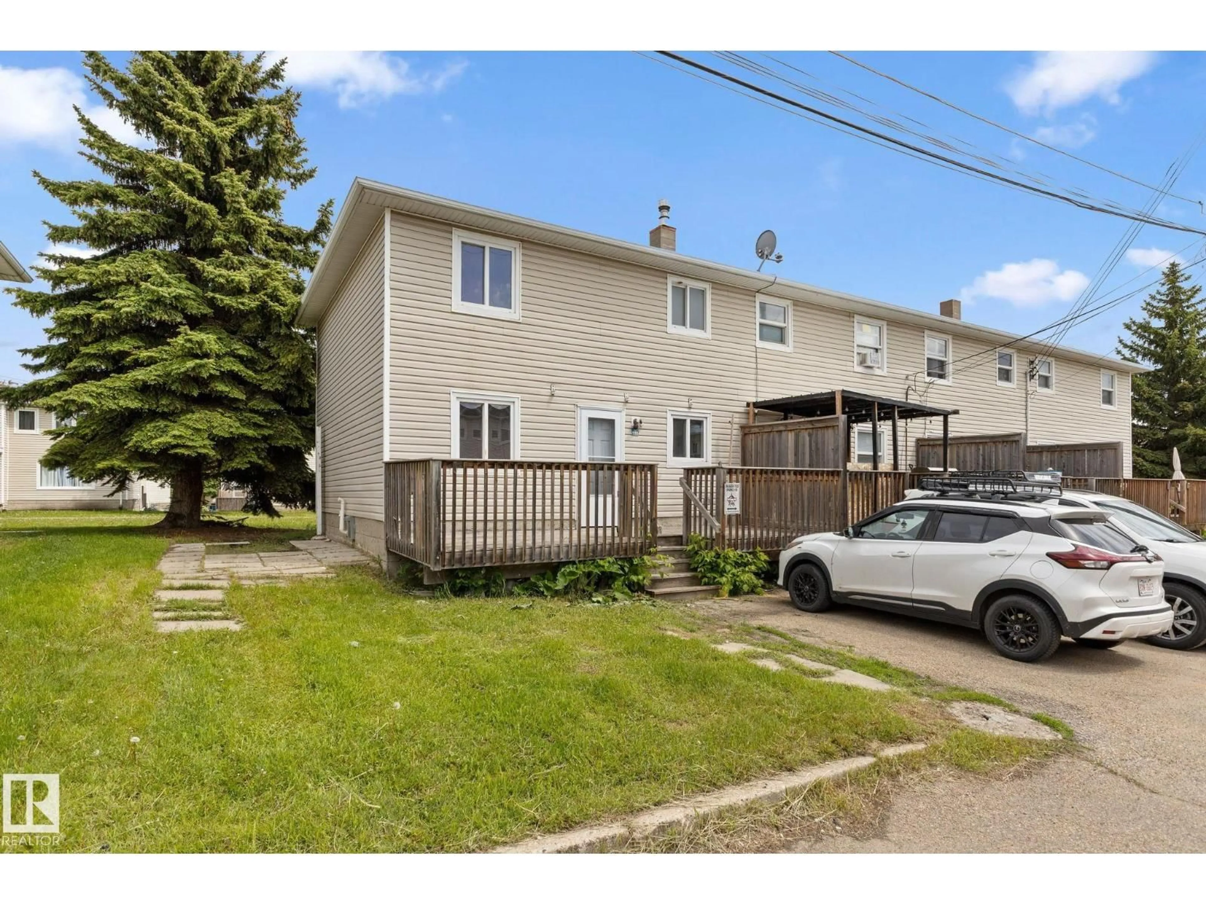 A pic from outside/outdoor area/front of a property/back of a property/a pic from drone, street for #110 - 12988 122B AV, Edmonton Alberta T5L2X2