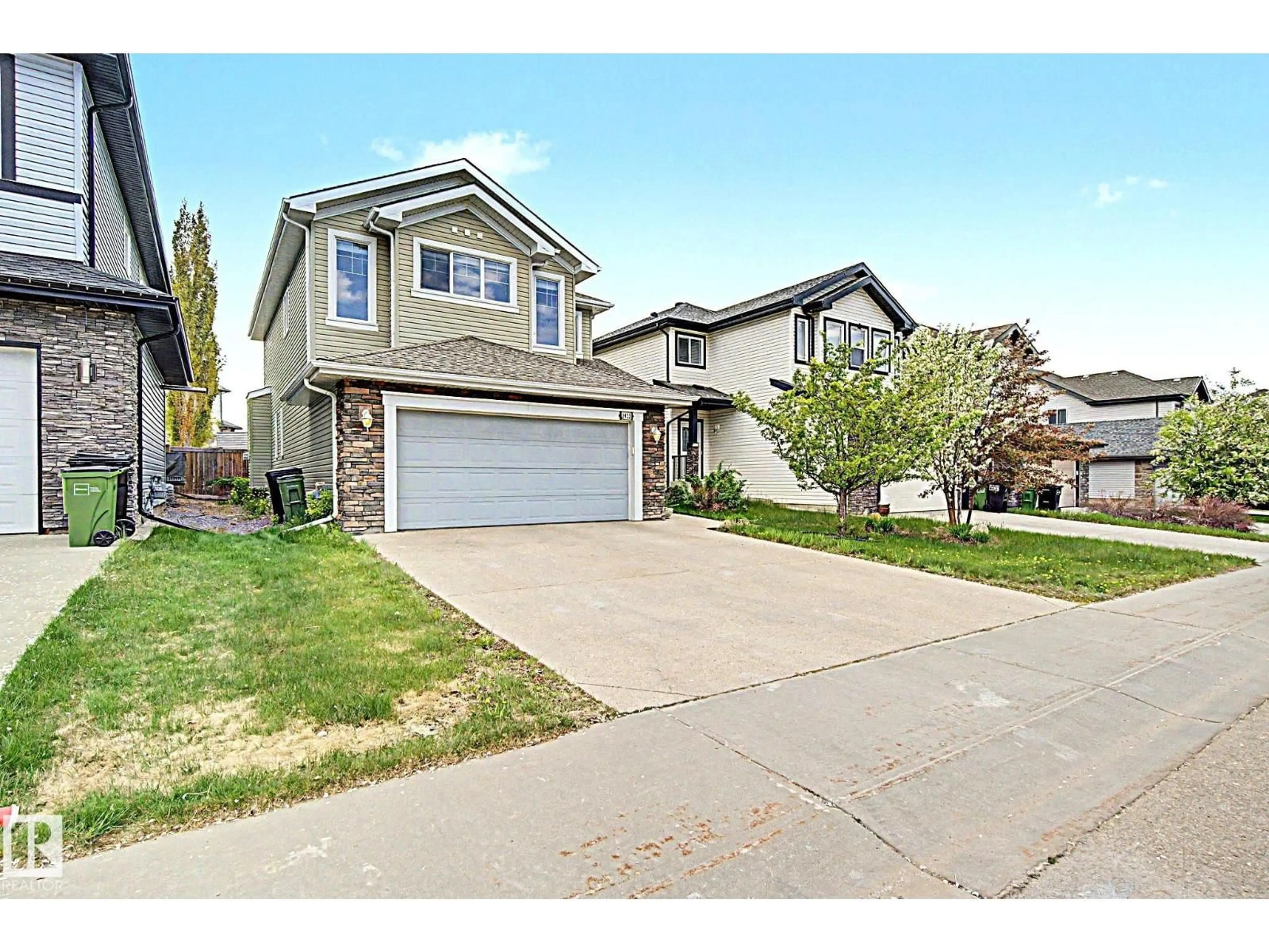 Home with vinyl exterior material, street for SW - 1932 67 ST, Edmonton Alberta T6X0L9