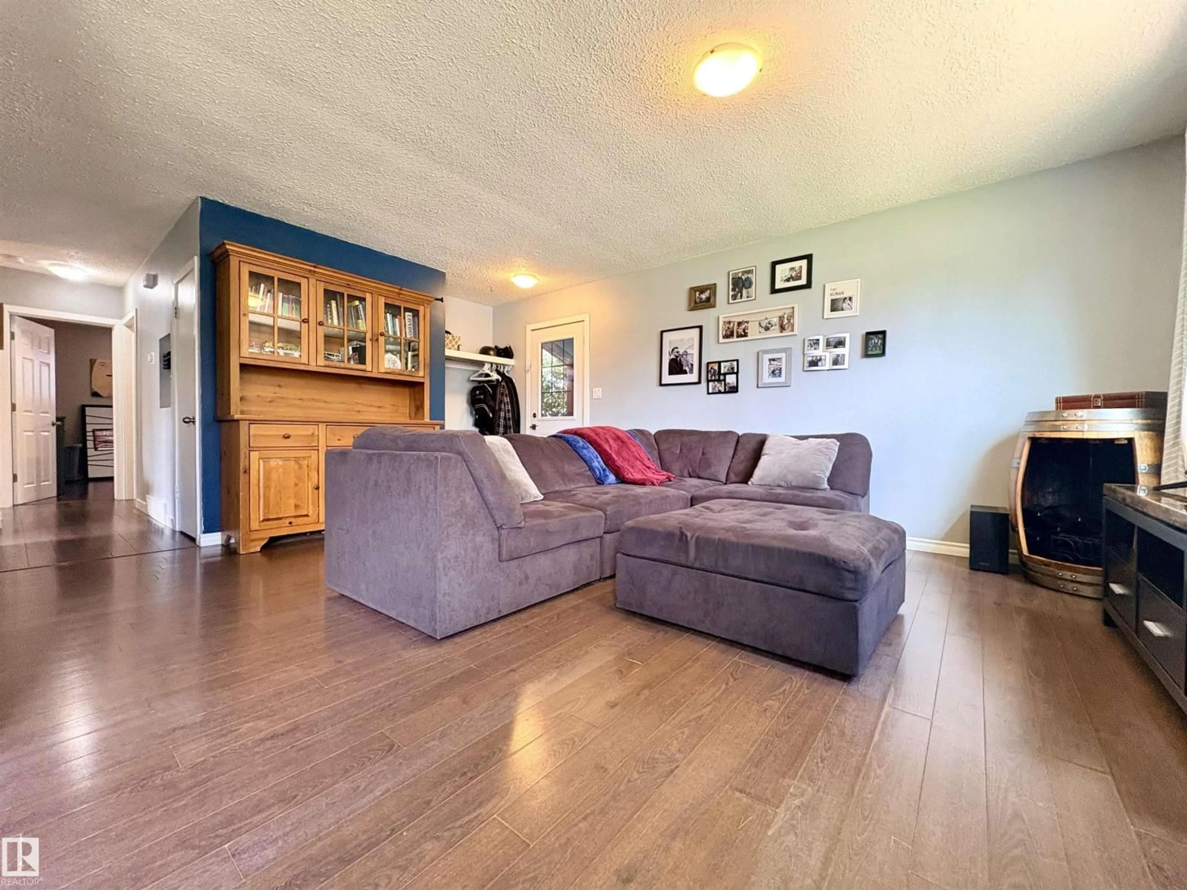 Living room with furniture, unknown for 13316 106 ST, Edmonton Alberta T5E4S5