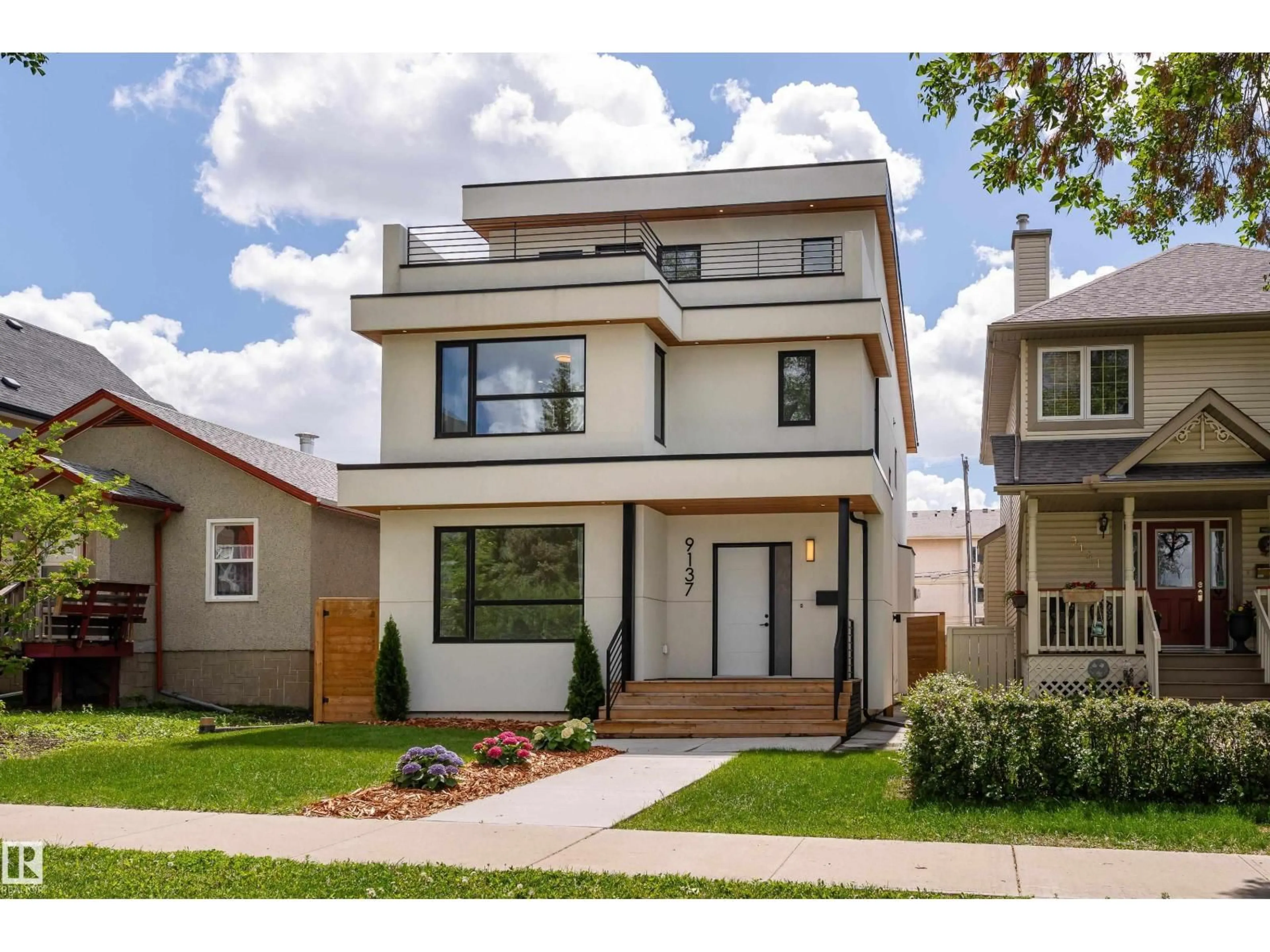 Home with brick exterior material, street for 9137 84 AV NW, Edmonton Alberta T6C1E5