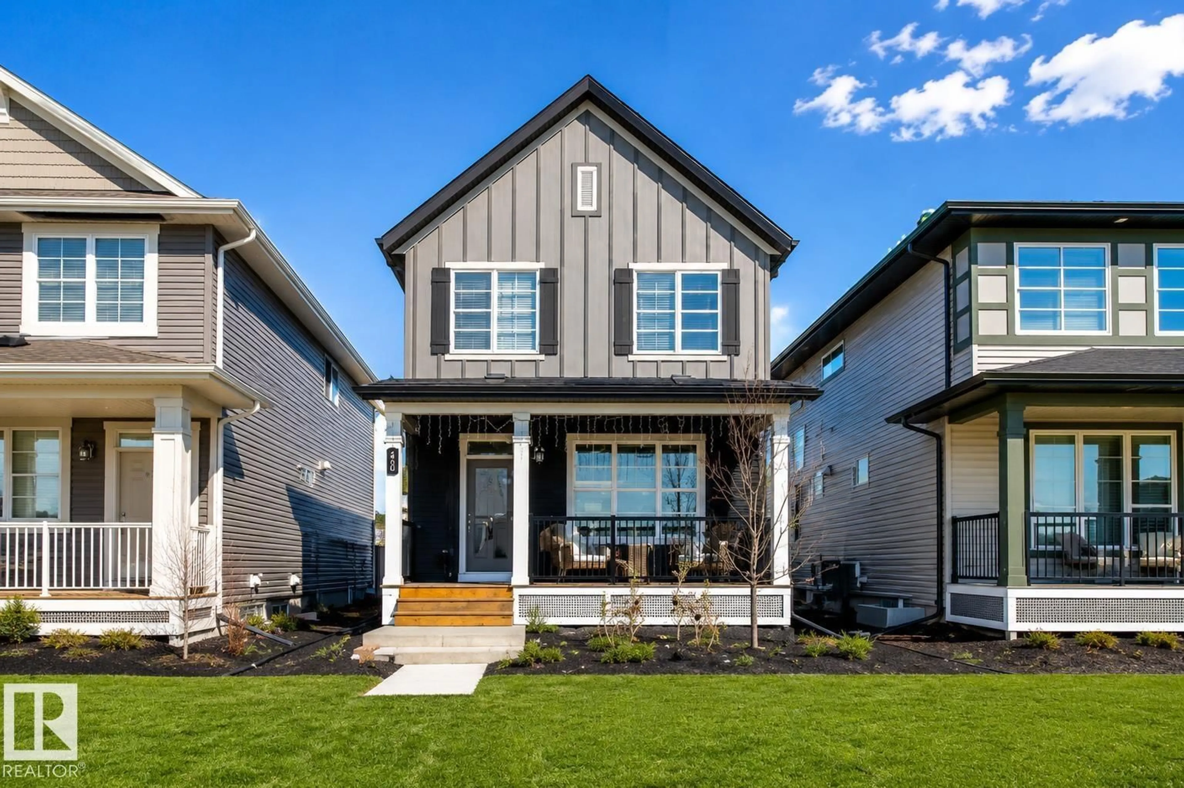 Home with vinyl exterior material, street for 1908 25 ST, Edmonton Alberta T6T2H7