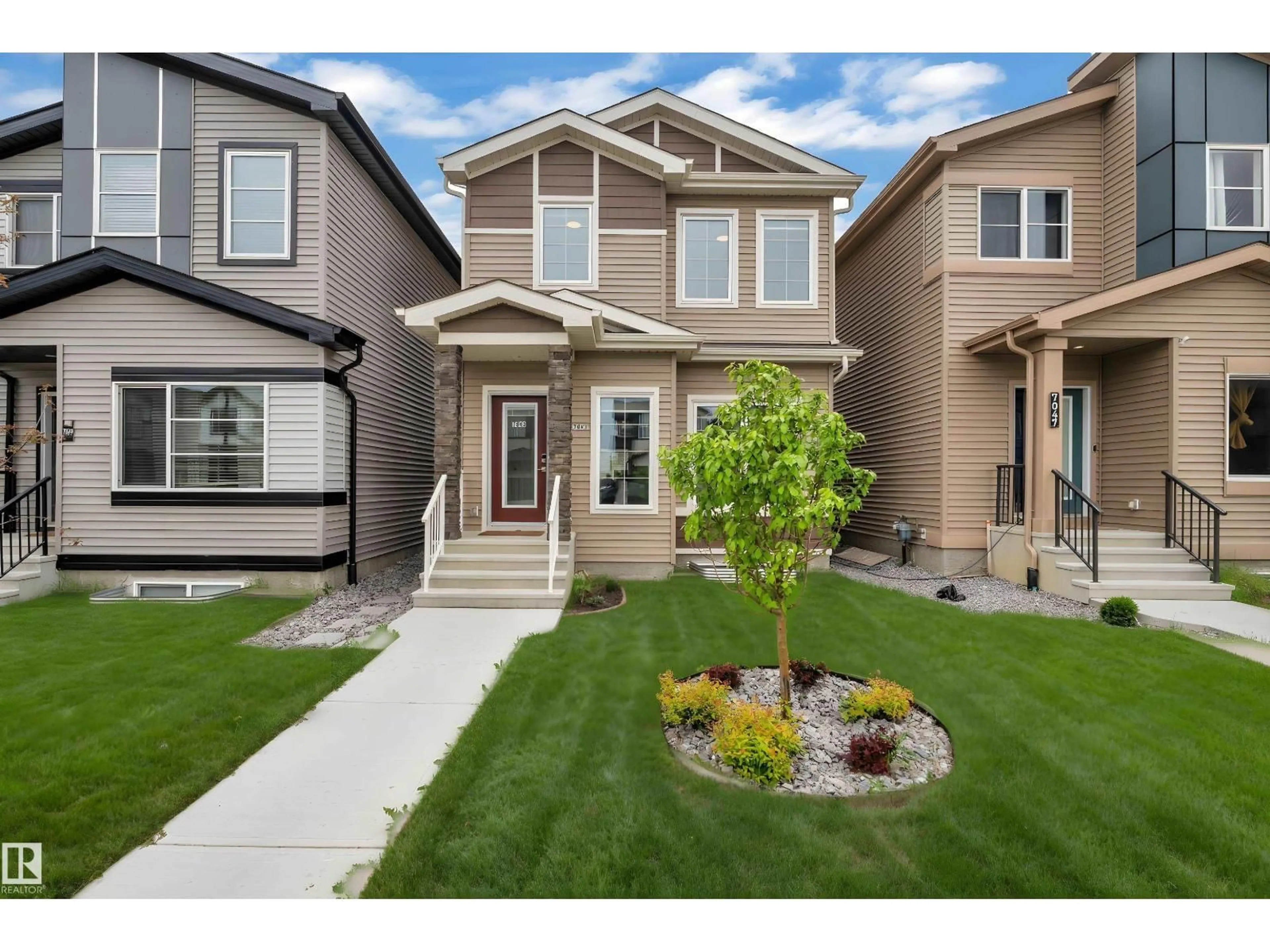 Home with vinyl exterior material, street for 7043 182 AV, Edmonton Alberta T5Z0V6