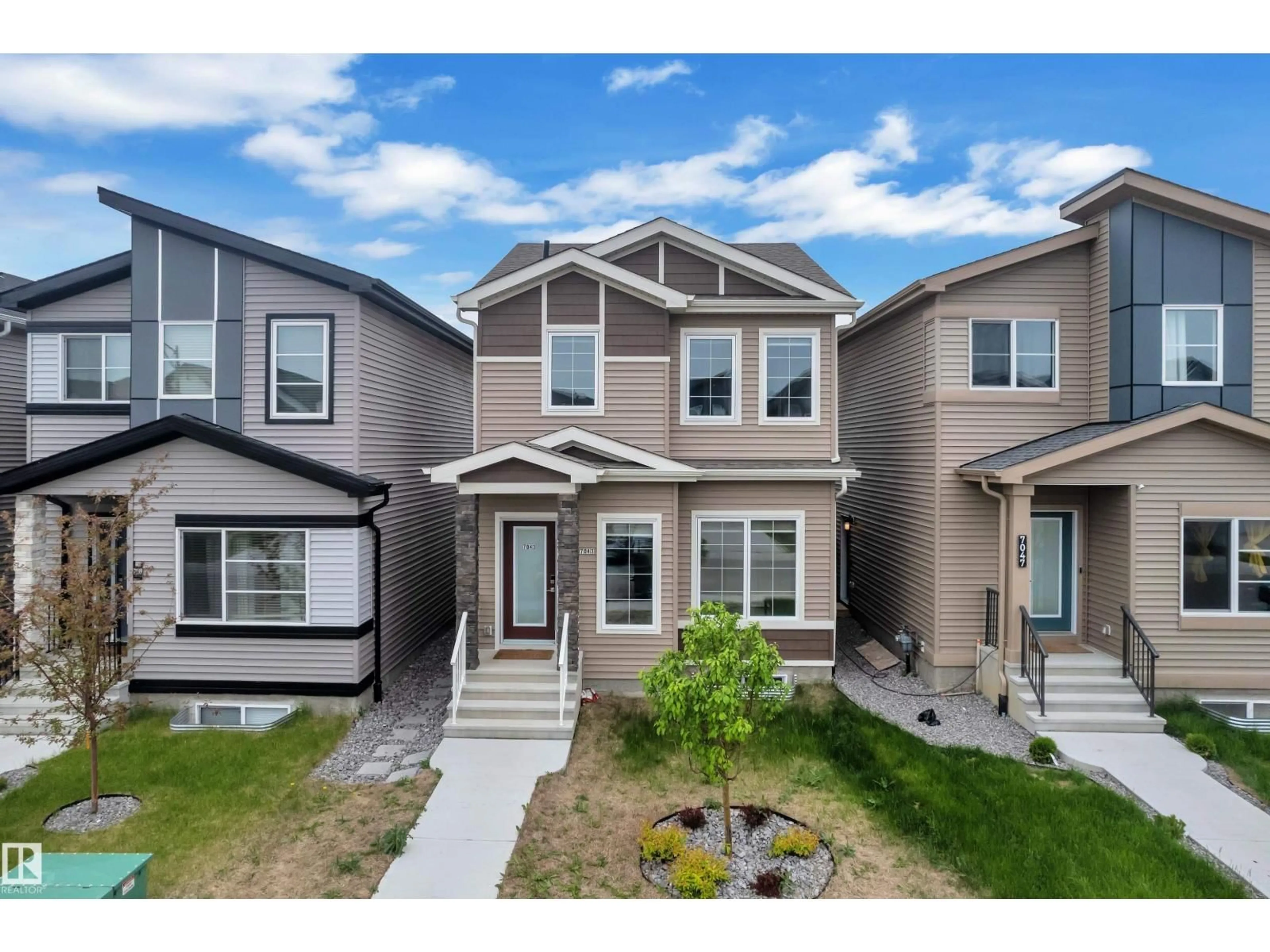 Home with vinyl exterior material, street for 7043 182 AV, Edmonton Alberta T5Z0V6