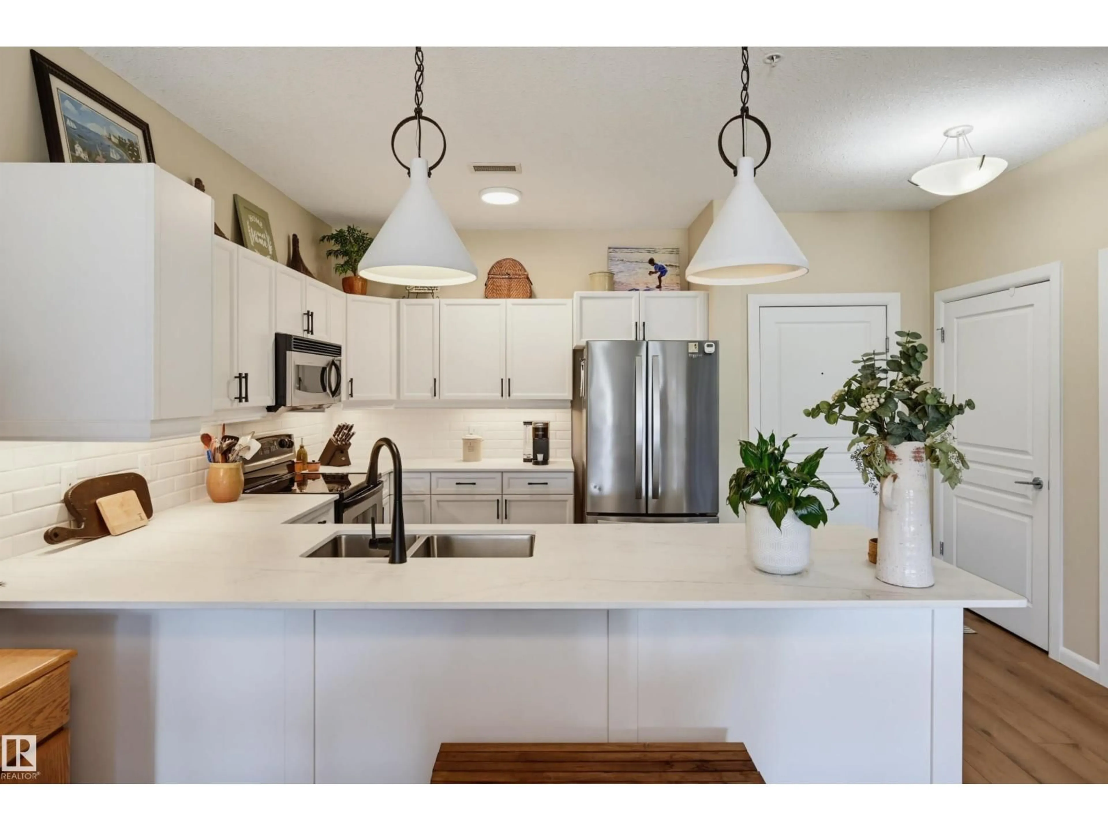 Open concept kitchen, ceramic/tile floor for 160 - 328 MAGRATH RD, Edmonton Alberta T6R3T7