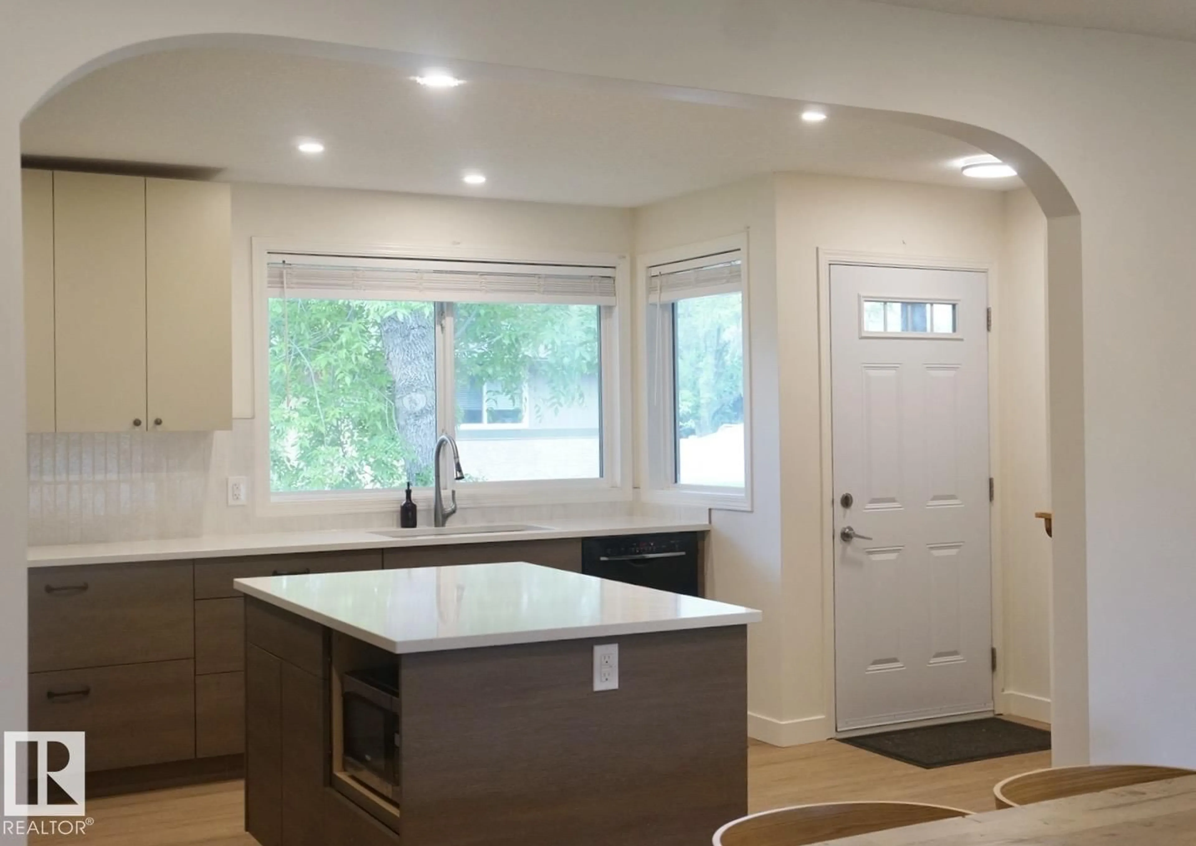 Open concept kitchen, ceramic/tile floor for #25 - 8930 99 AV, Fort Saskatchewan Alberta T8L3L1
