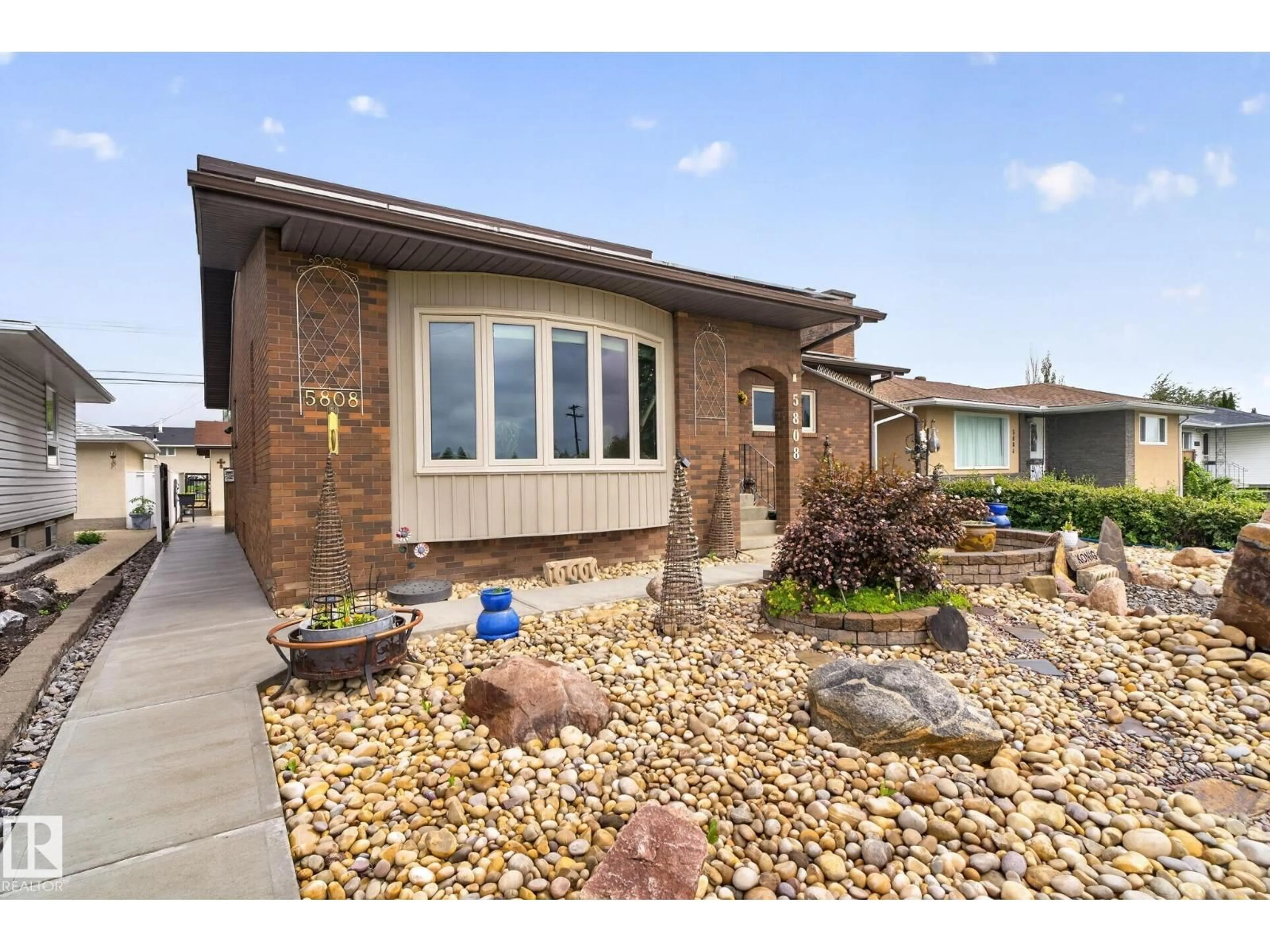Home with brick exterior material, street for 5808 AUSTIN O'BRIEN RD, Edmonton Alberta T6B2E9
