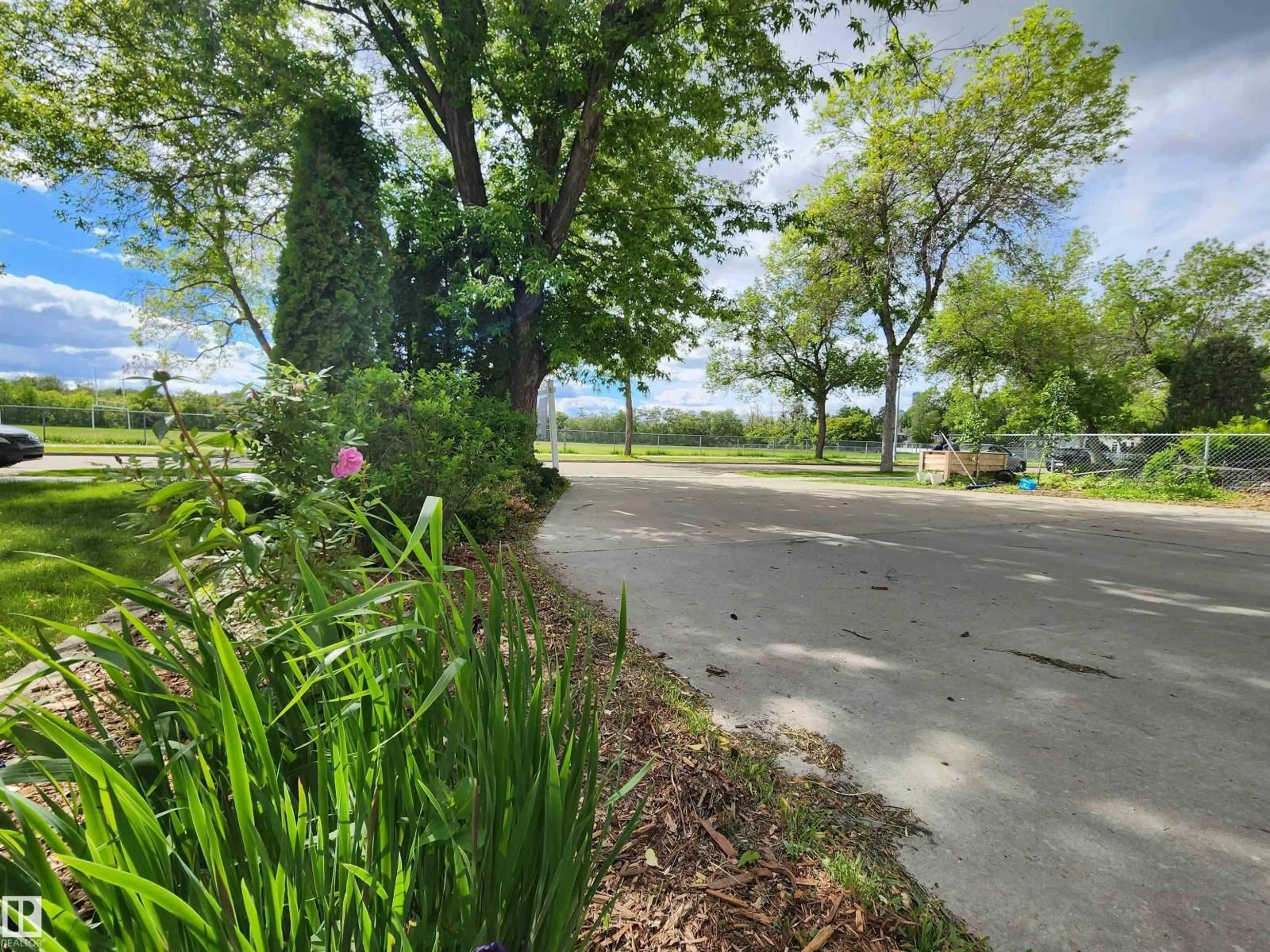 A pic from outside/outdoor area/front of a property/back of a property/a pic from drone, street for 9023 95 ST, Edmonton Alberta T6C3W7