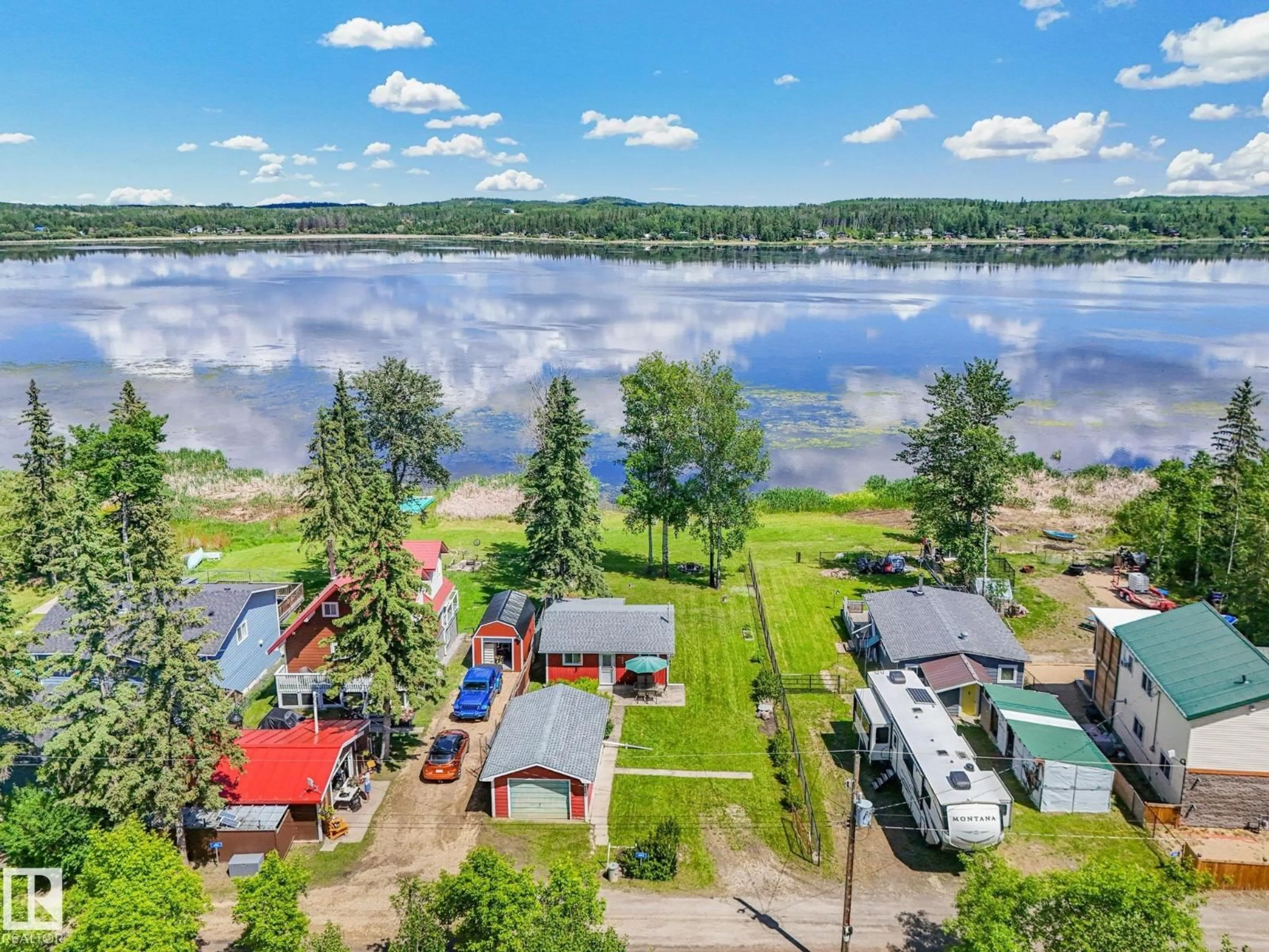 A pic from outside/outdoor area/front of a property/back of a property/a pic from drone, water/lake/river/ocean view for 604 BLUE HERON DRIVE, Rural Lac Ste. Anne County Alberta T0E1V0