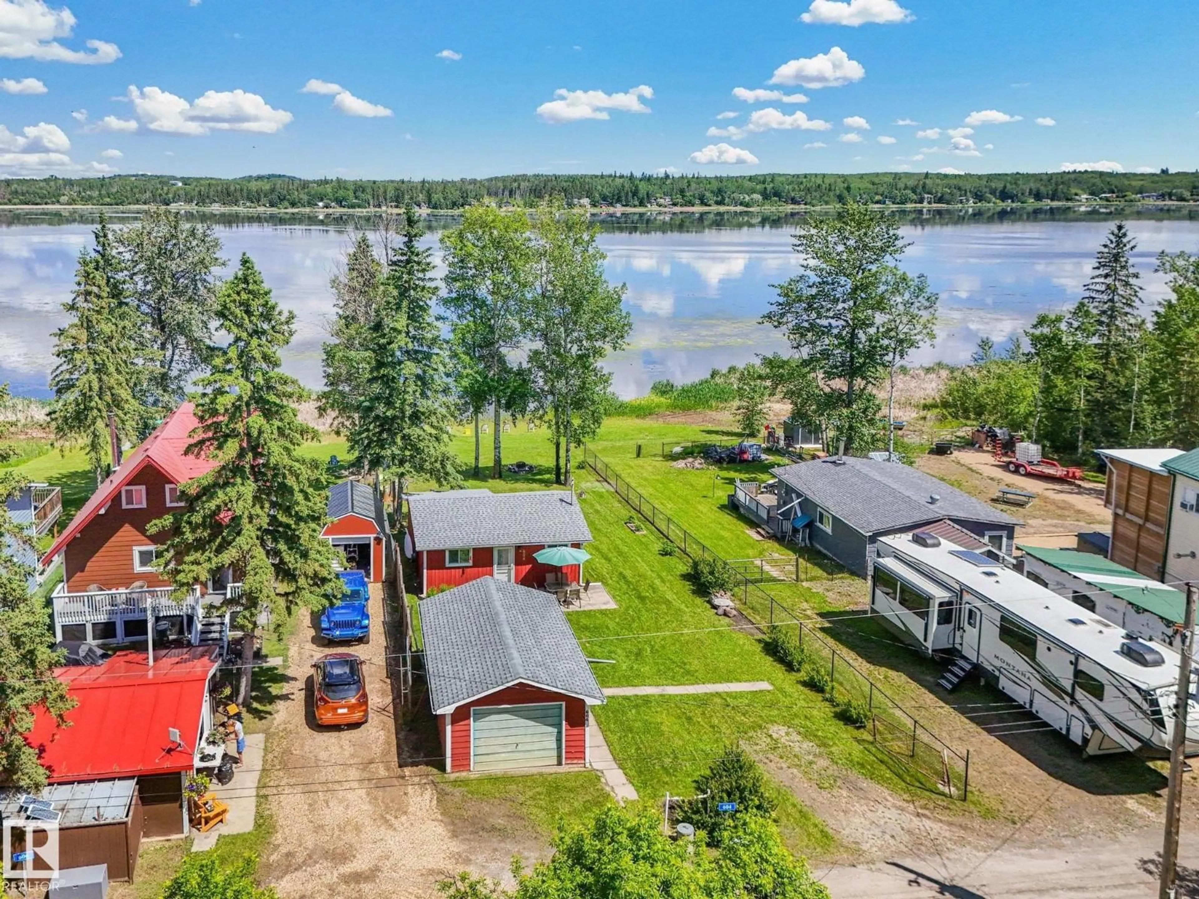 A pic from outside/outdoor area/front of a property/back of a property/a pic from drone, water/lake/river/ocean view for 604 BLUE HERON DRIVE, Rural Lac Ste. Anne County Alberta T0E1V0