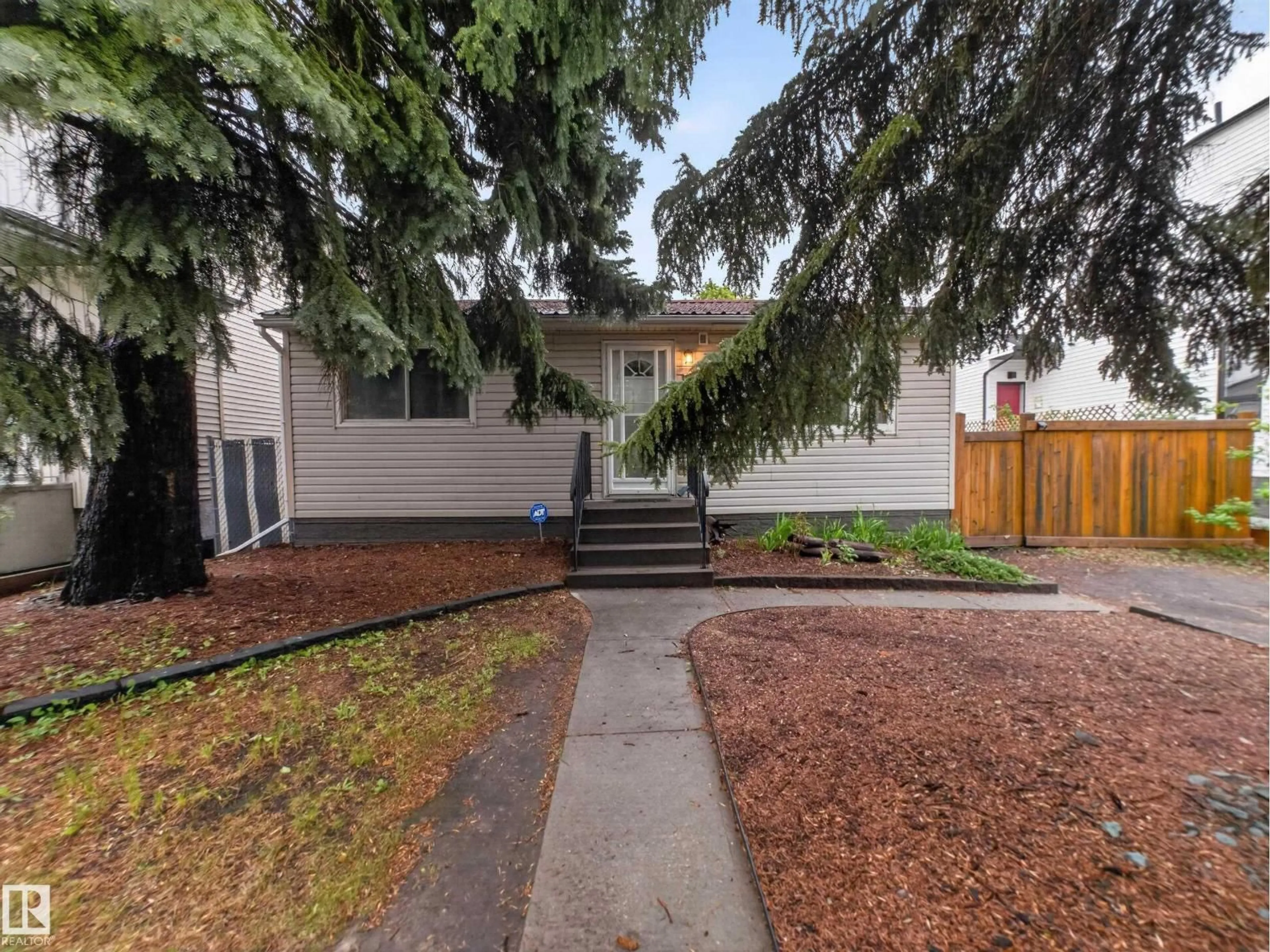 Home with vinyl exterior material, street for 10809 150 ST, Edmonton Alberta T5P1R6