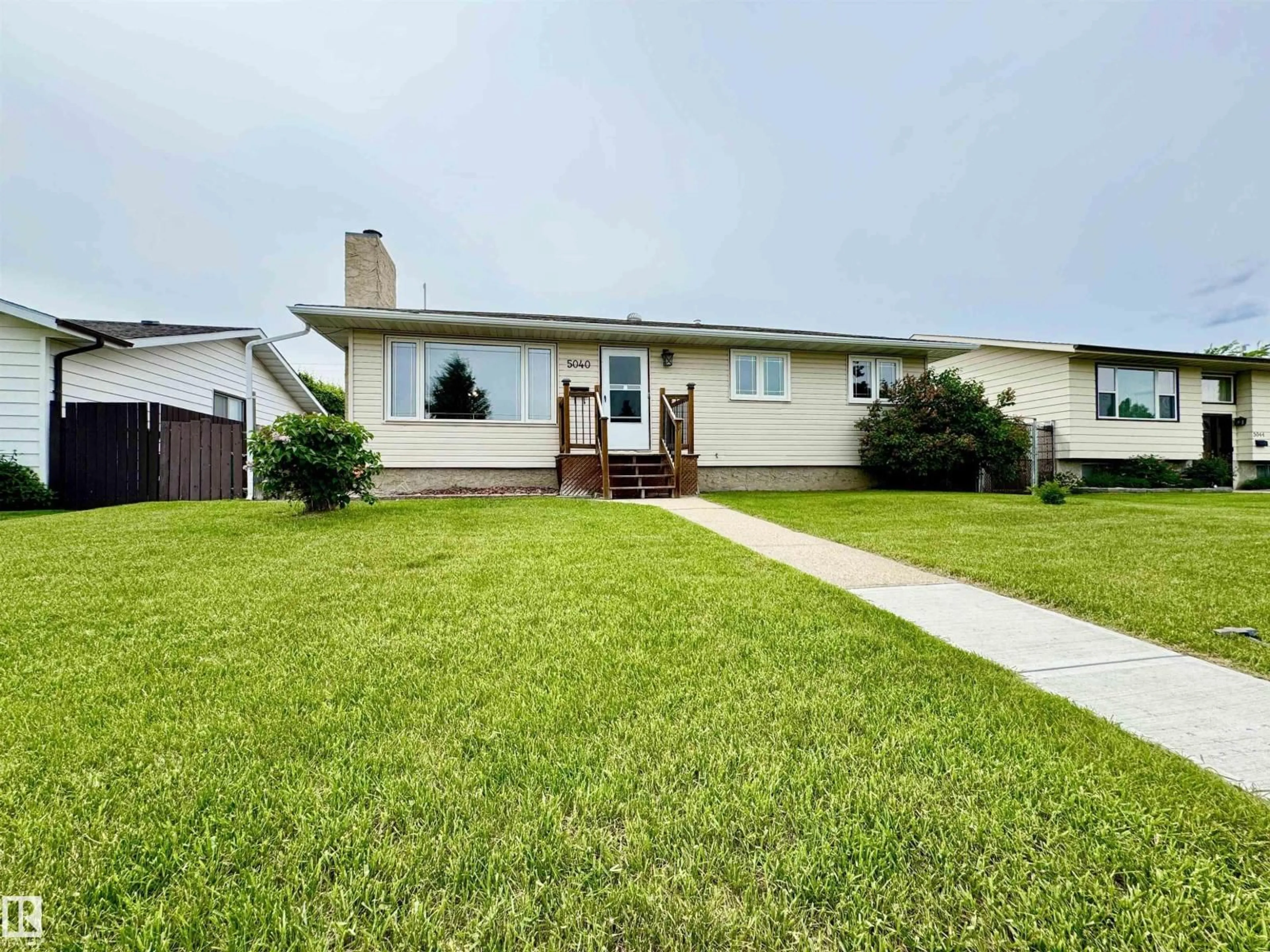 Home with vinyl exterior material, street for 5040 47 ST, Lamont Alberta T0B2R0