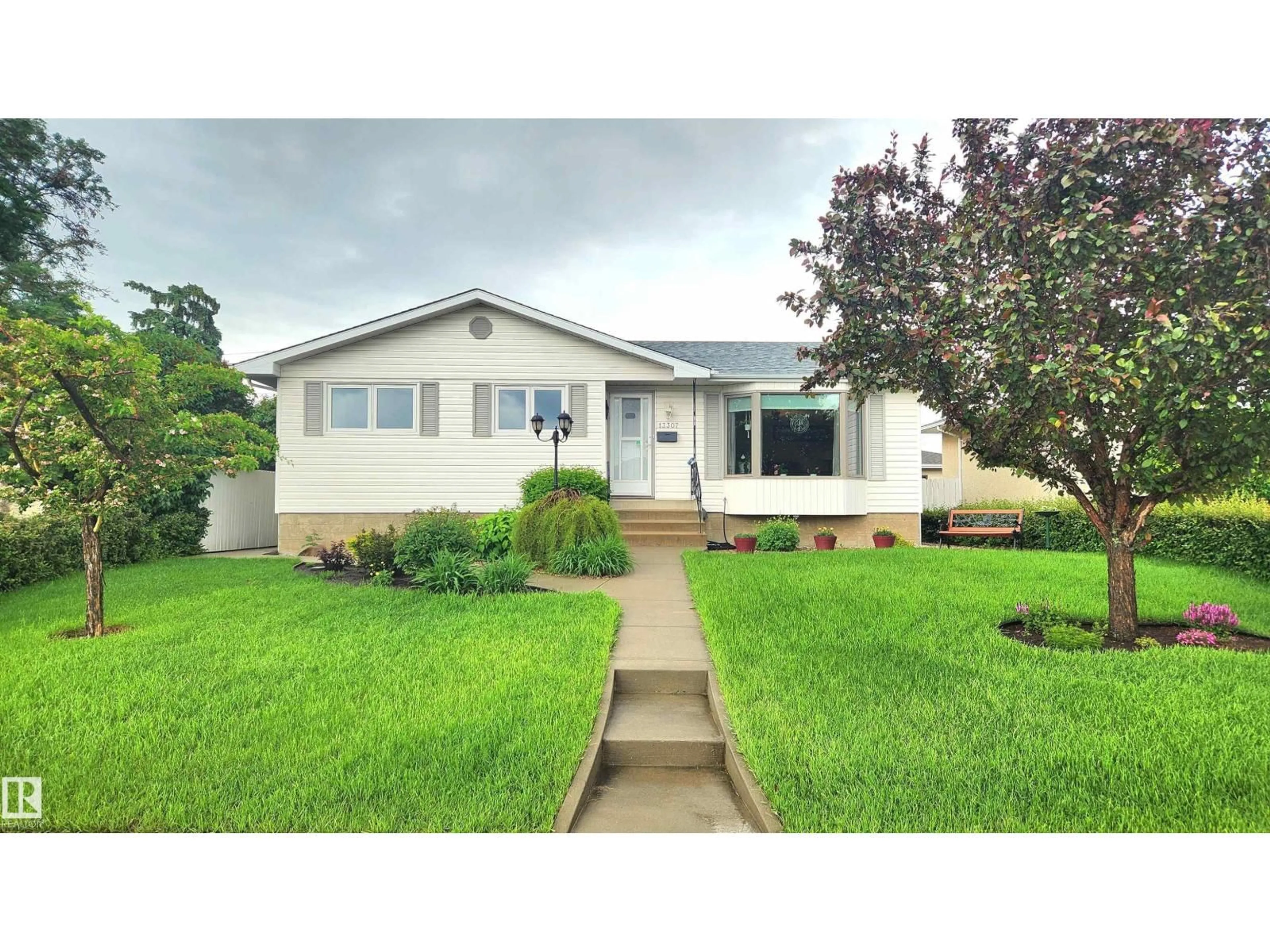 Home with vinyl exterior material, street for 13307 DELWOOD RD, Edmonton Alberta T5C3B5